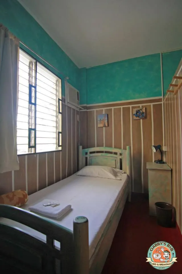 Bed in Gabby's Bed & Breakfast