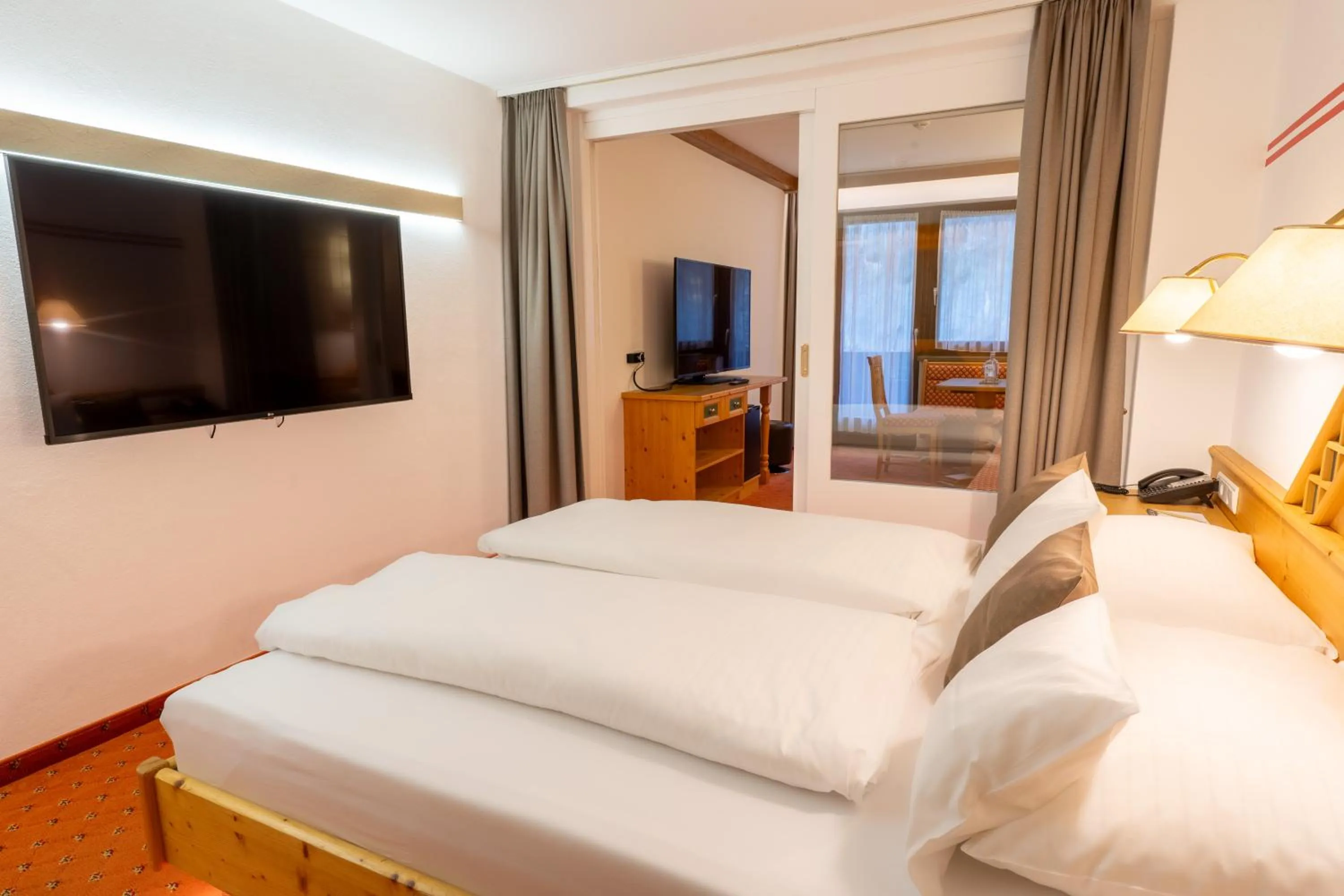 Photo of the whole room, Bed in Alpenbad Hotel Hohenhaus