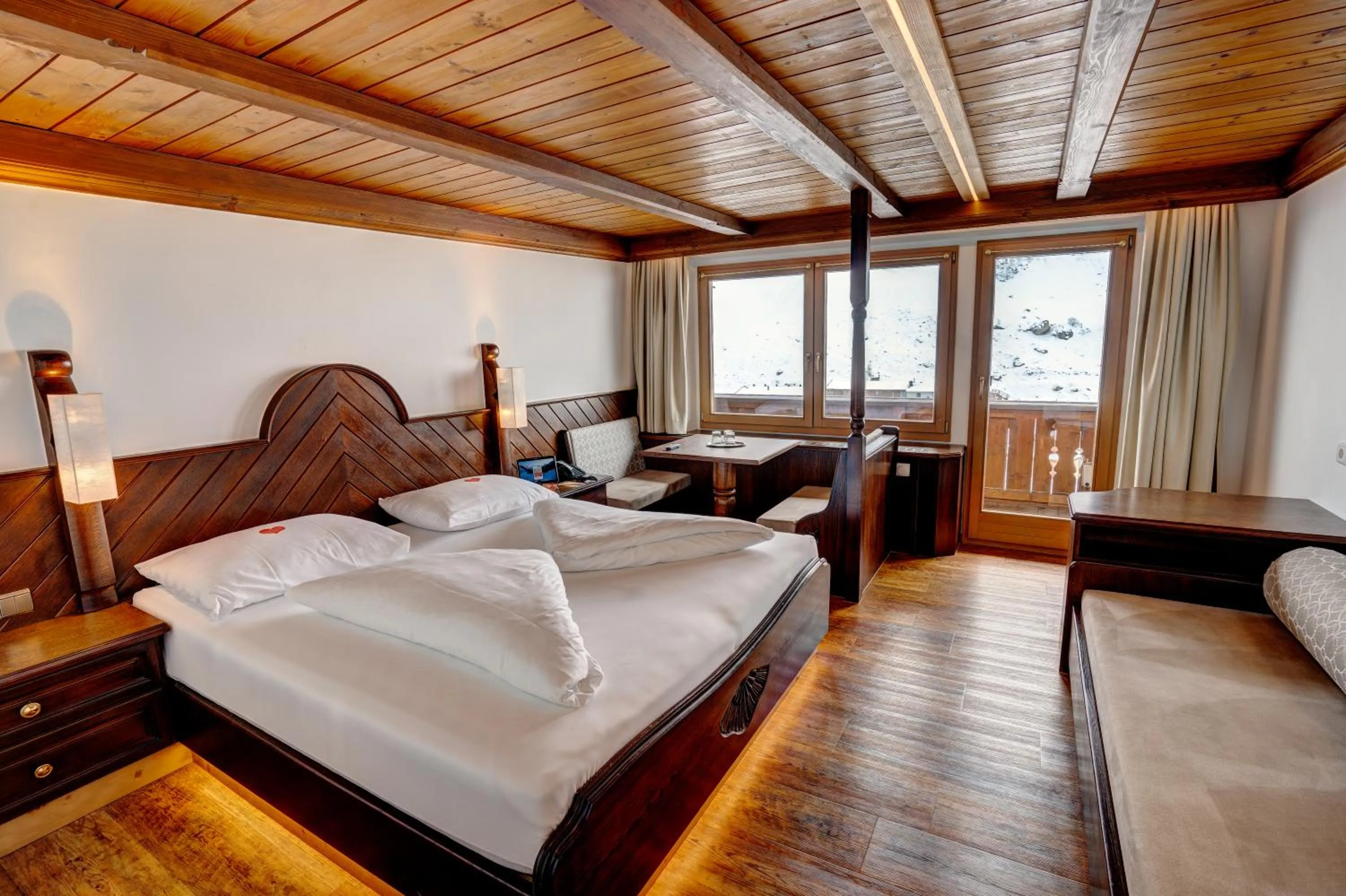 Photo of the whole room, Bed in Alpenbad Hotel Hohenhaus