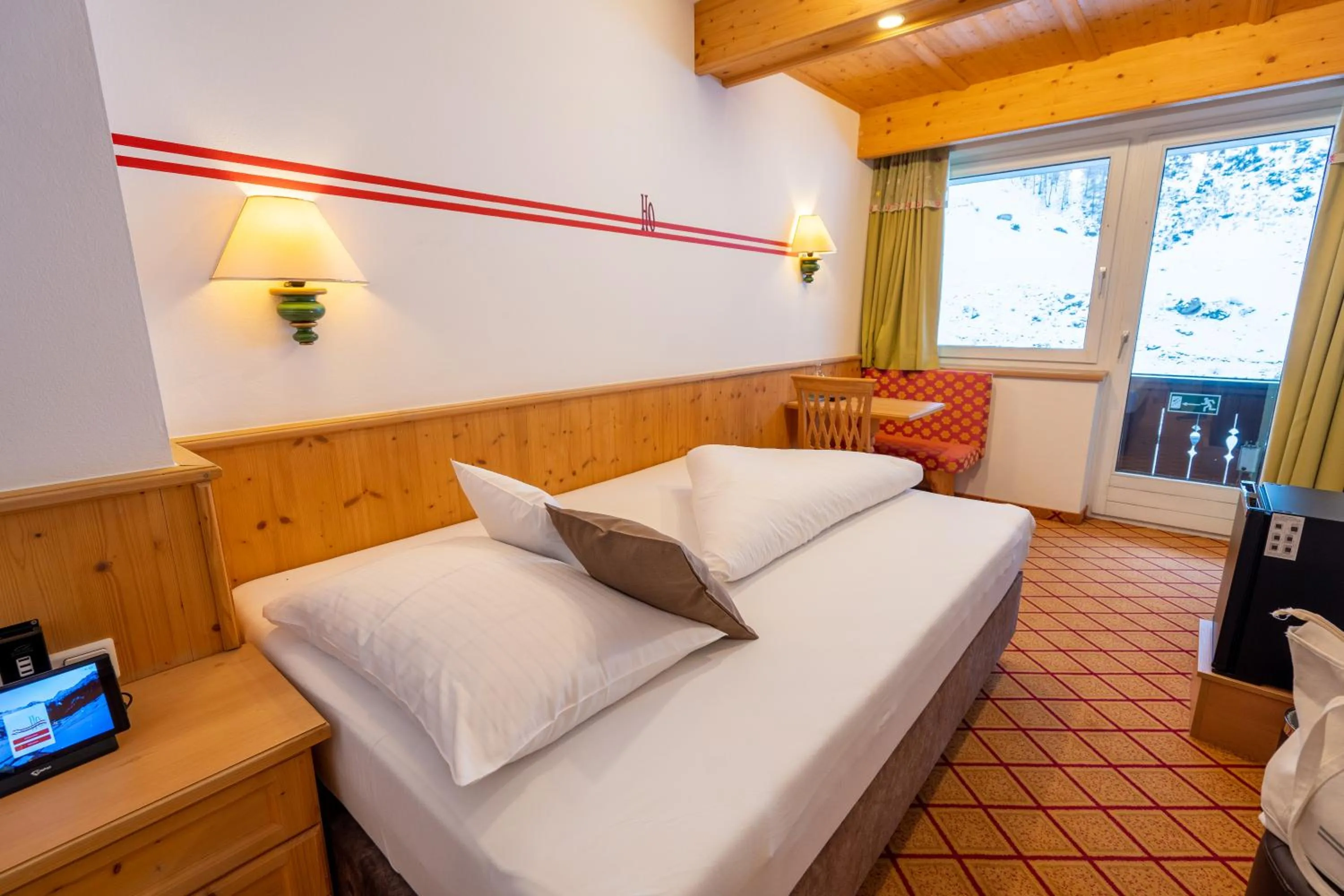 Photo of the whole room, Bed in Alpenbad Hotel Hohenhaus