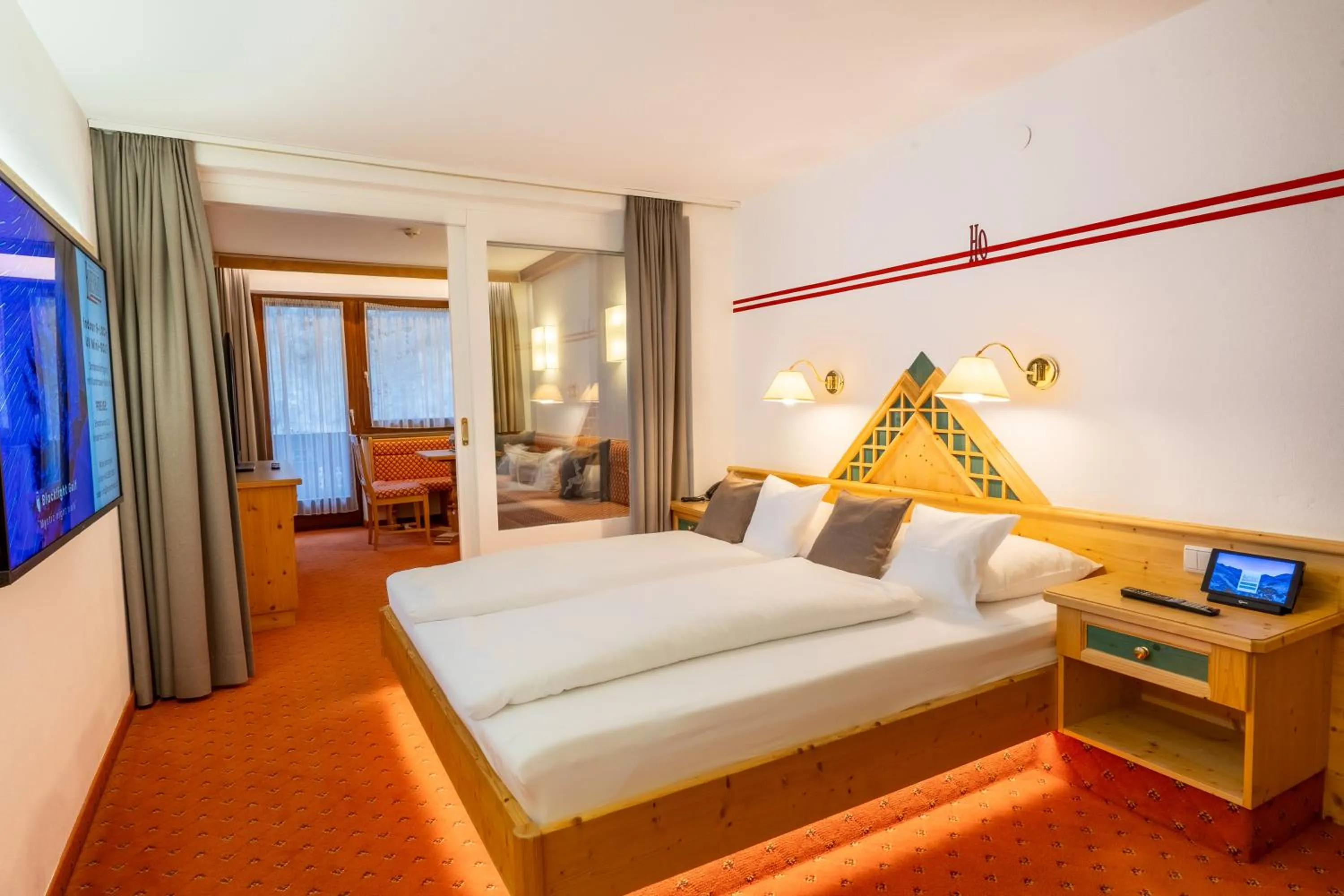 Photo of the whole room, Bed in Alpenbad Hotel Hohenhaus