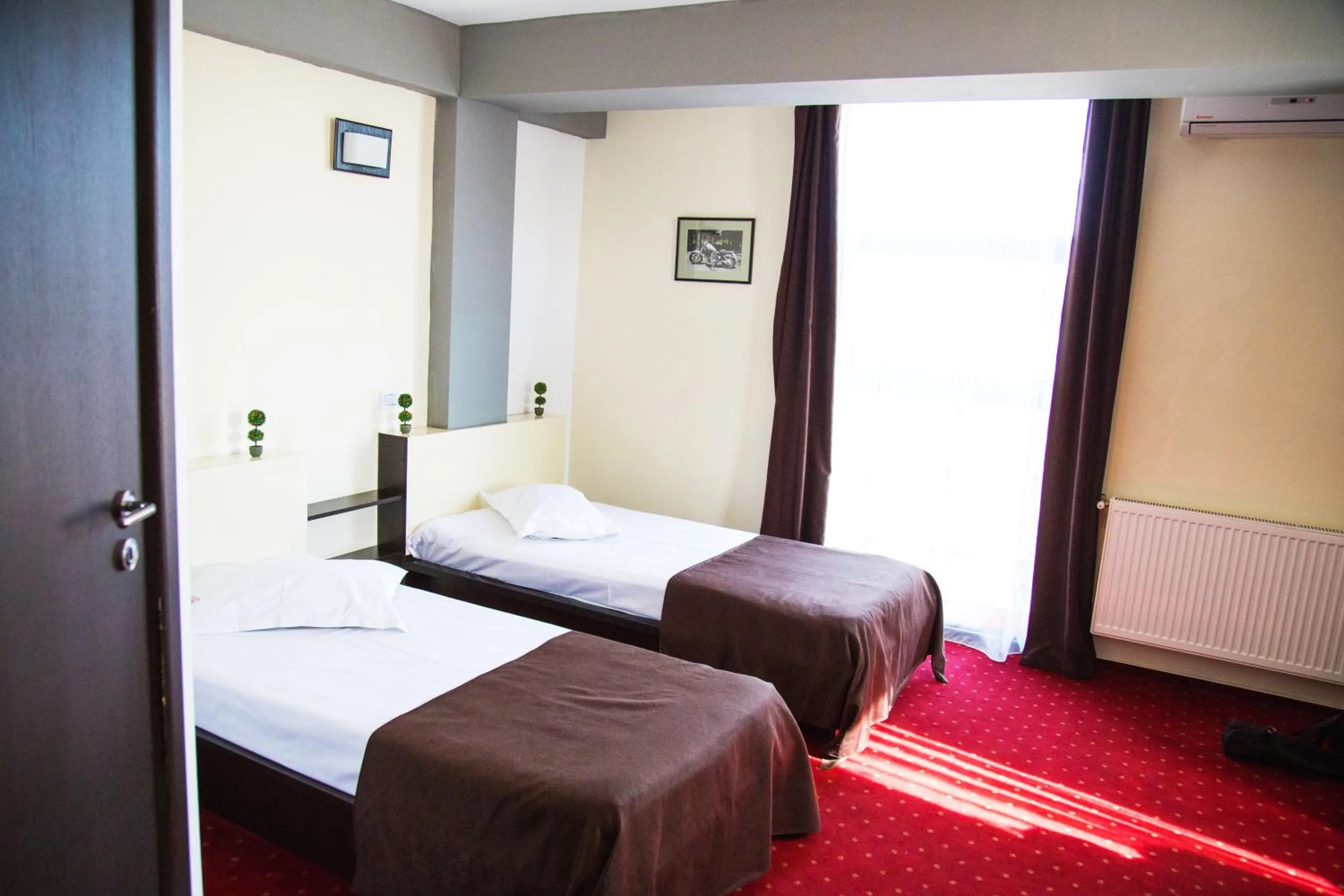 Living room, Bed in GP Hotel