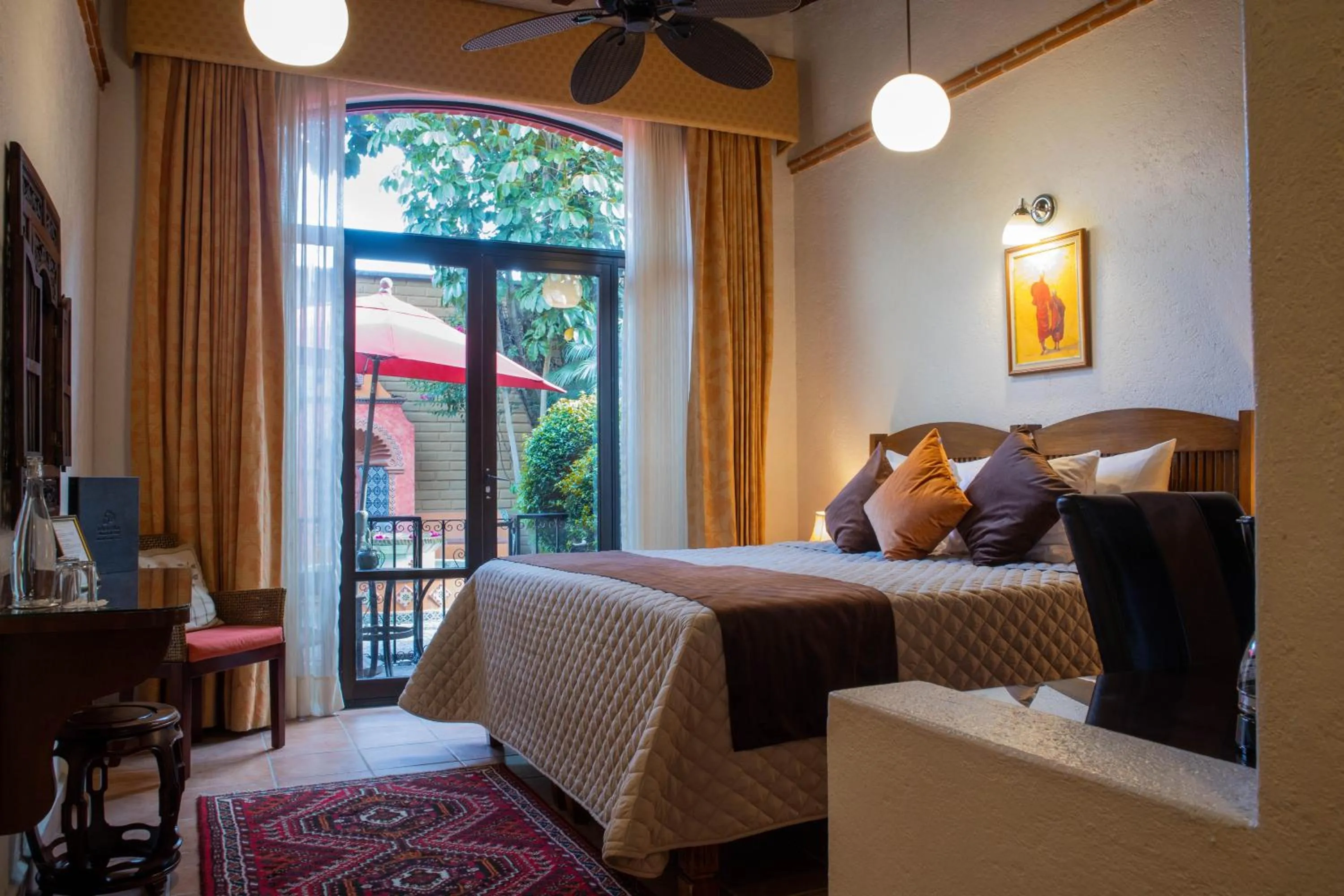 Bed in La Buena Vibra Wellness Resort & Spa