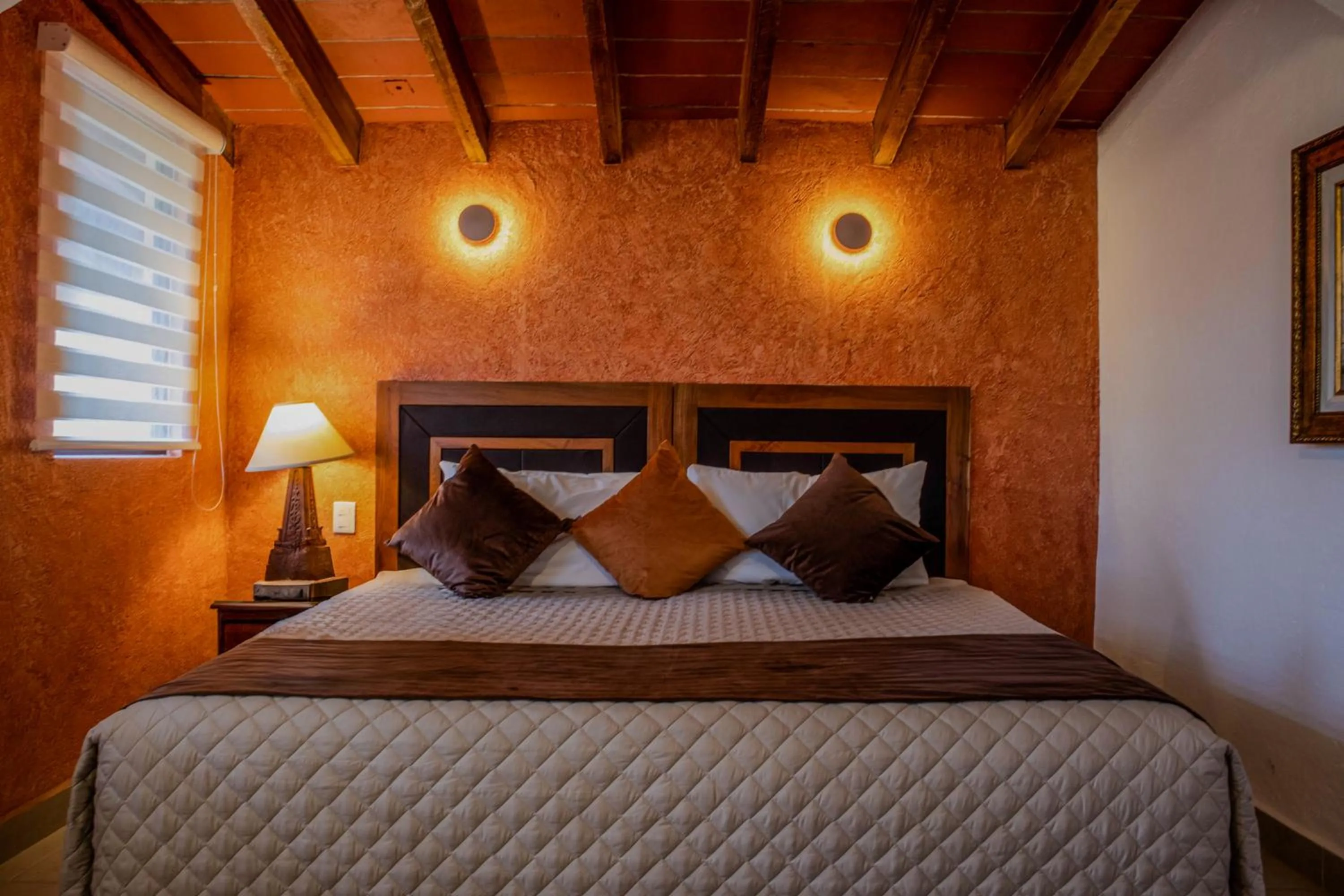 Bed in La Buena Vibra Wellness Resort & Spa