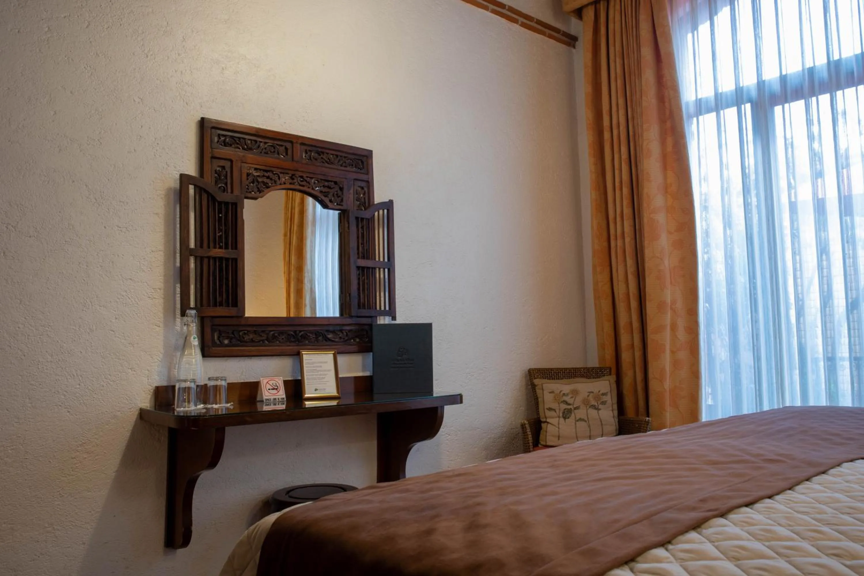 Bed in La Buena Vibra Wellness Resort & Spa