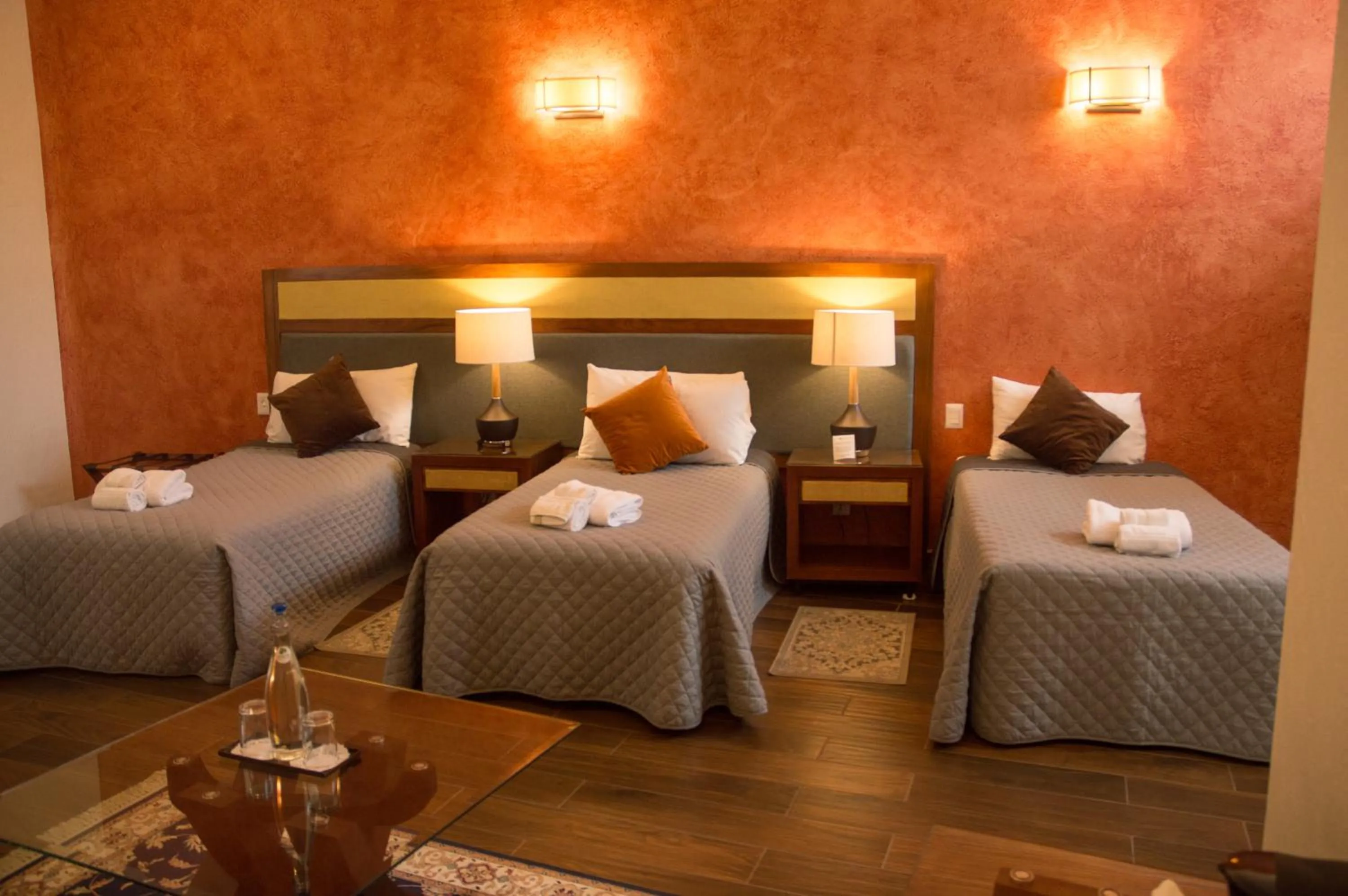 Bed in La Buena Vibra Wellness Resort & Spa