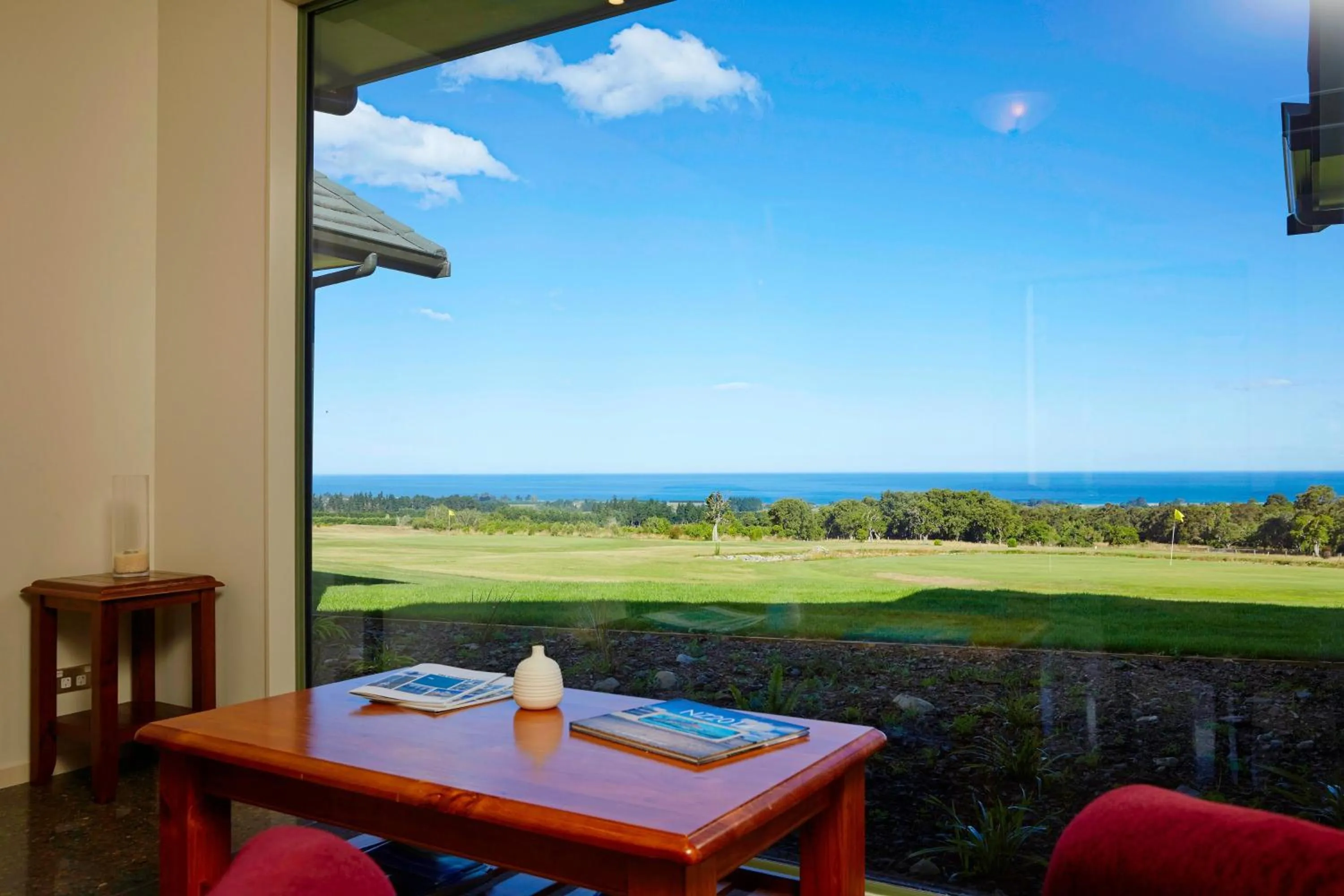 Communal lounge/ TV room in Koura Bay Golf Resort