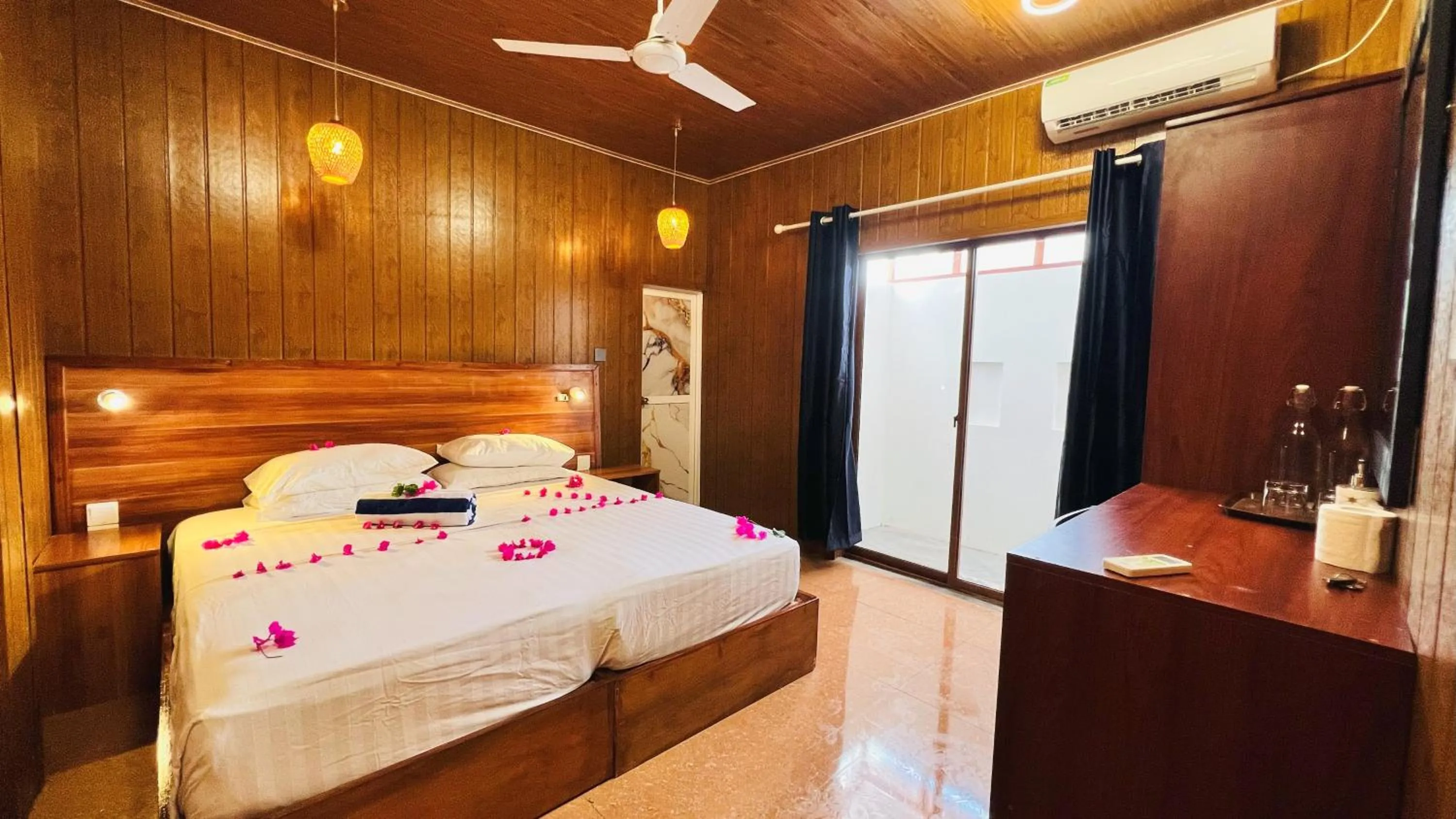 Bed in Batuta Maldives Surf View