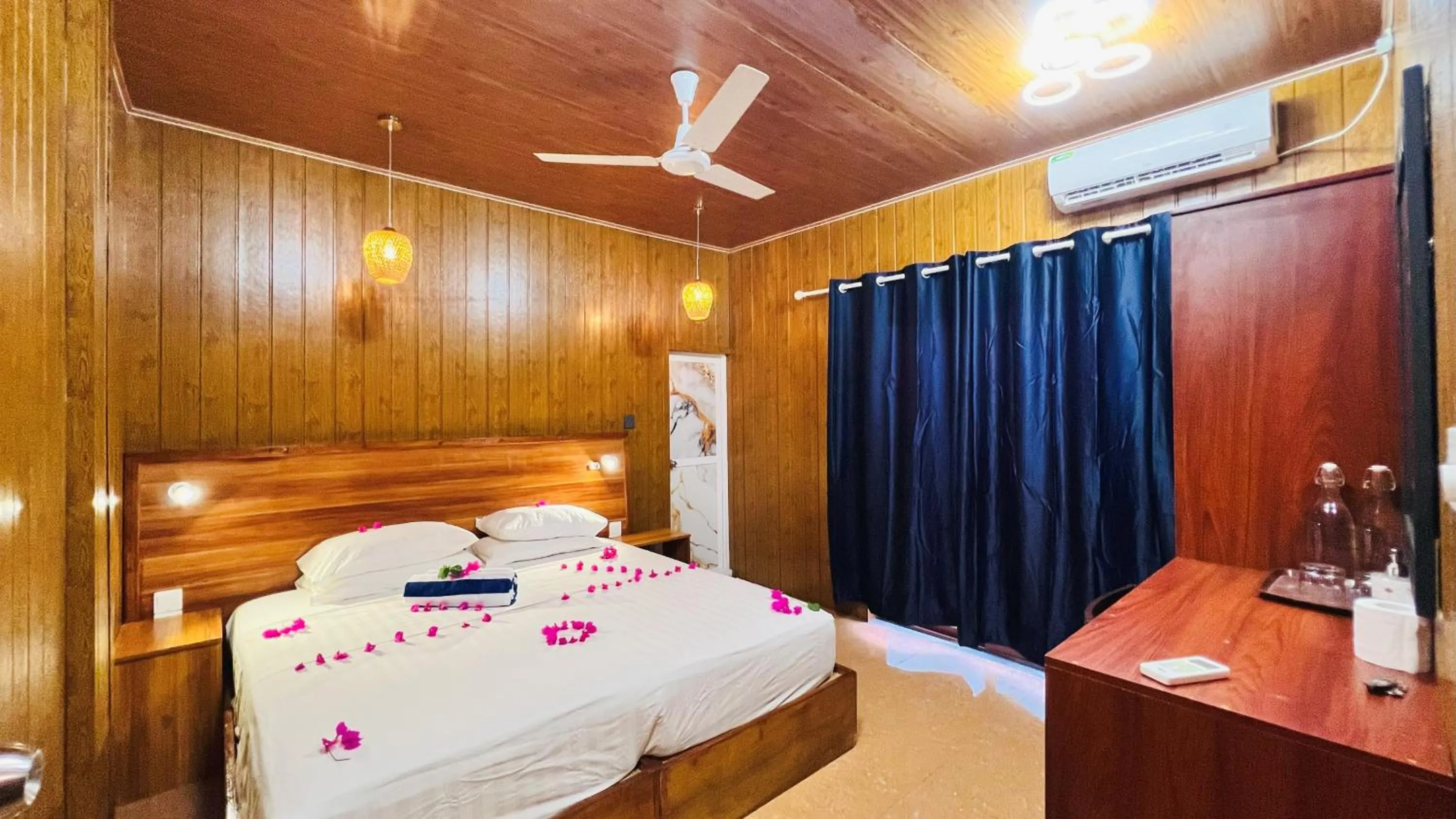 Bed in Batuta Maldives Surf View