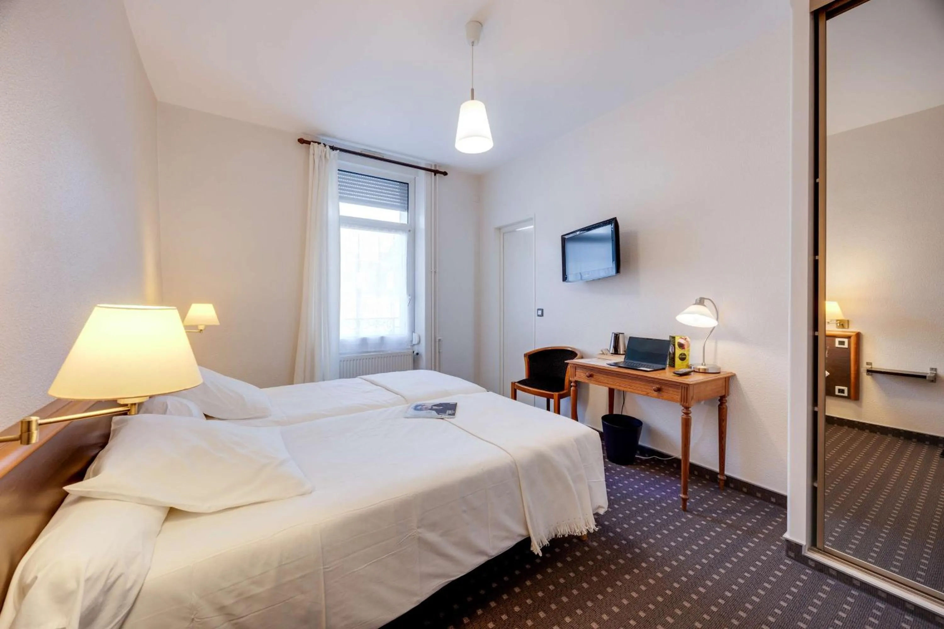 Bedroom, Bed in Brit Hotel Confort Bagnoles Normandie