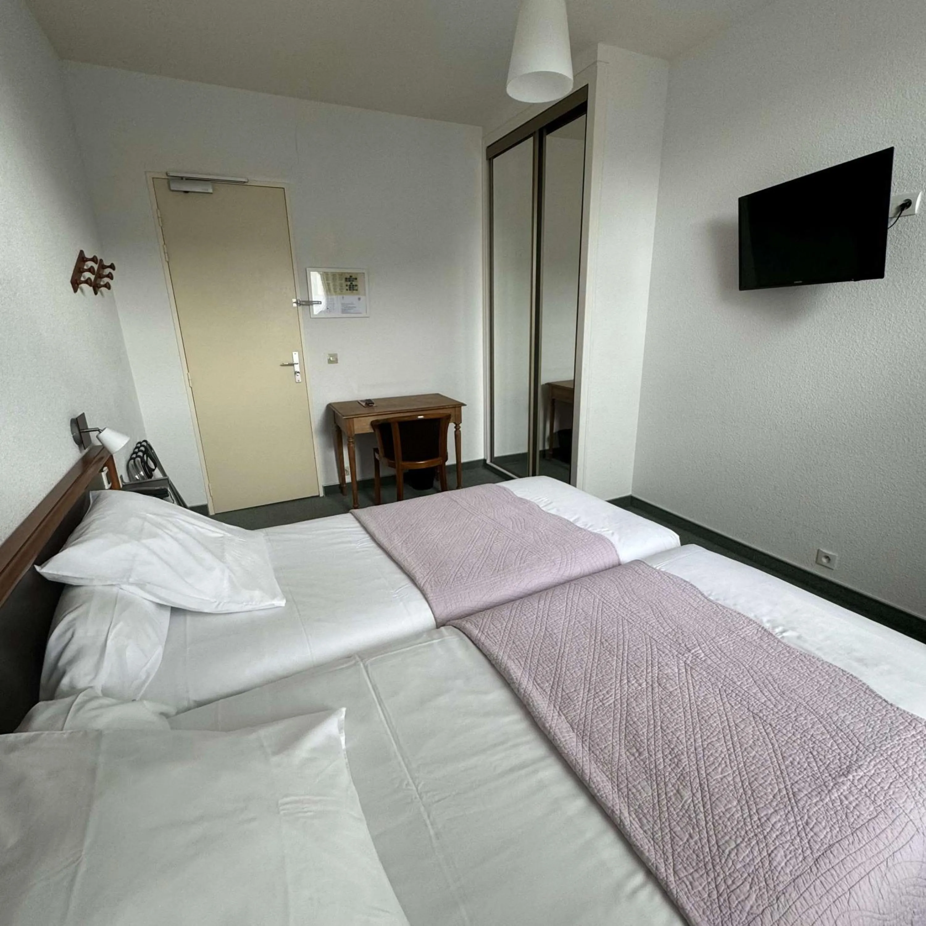 Bedroom, Bed in Brit Hotel Confort Bagnoles Normandie