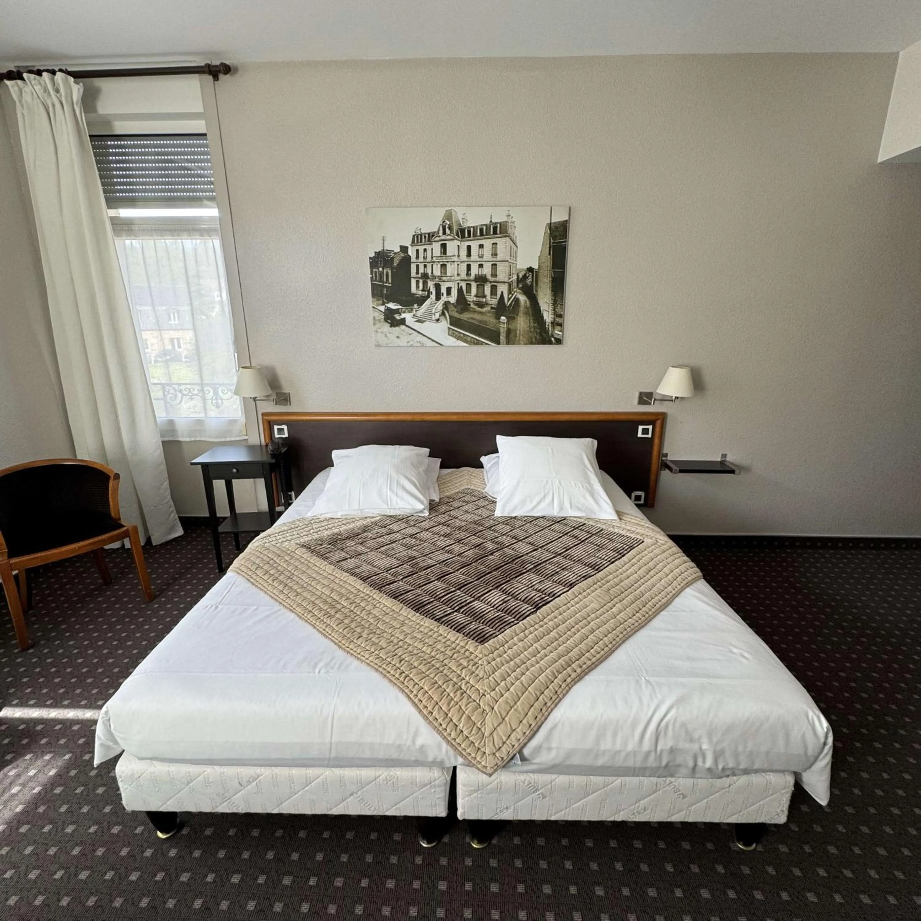 Bedroom, Bed in Brit Hotel Confort Bagnoles Normandie