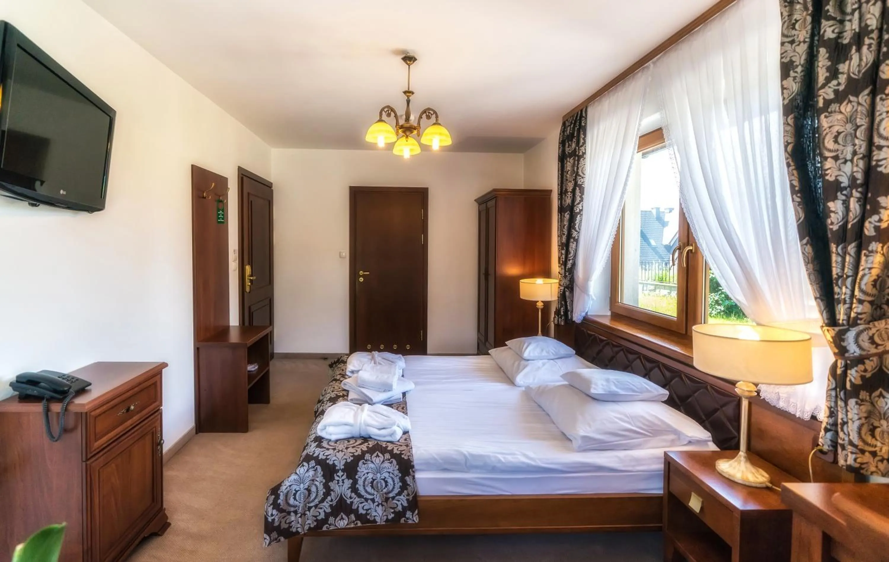 Photo of the whole room, Bed in Sądelski Dwór Medical & SPA