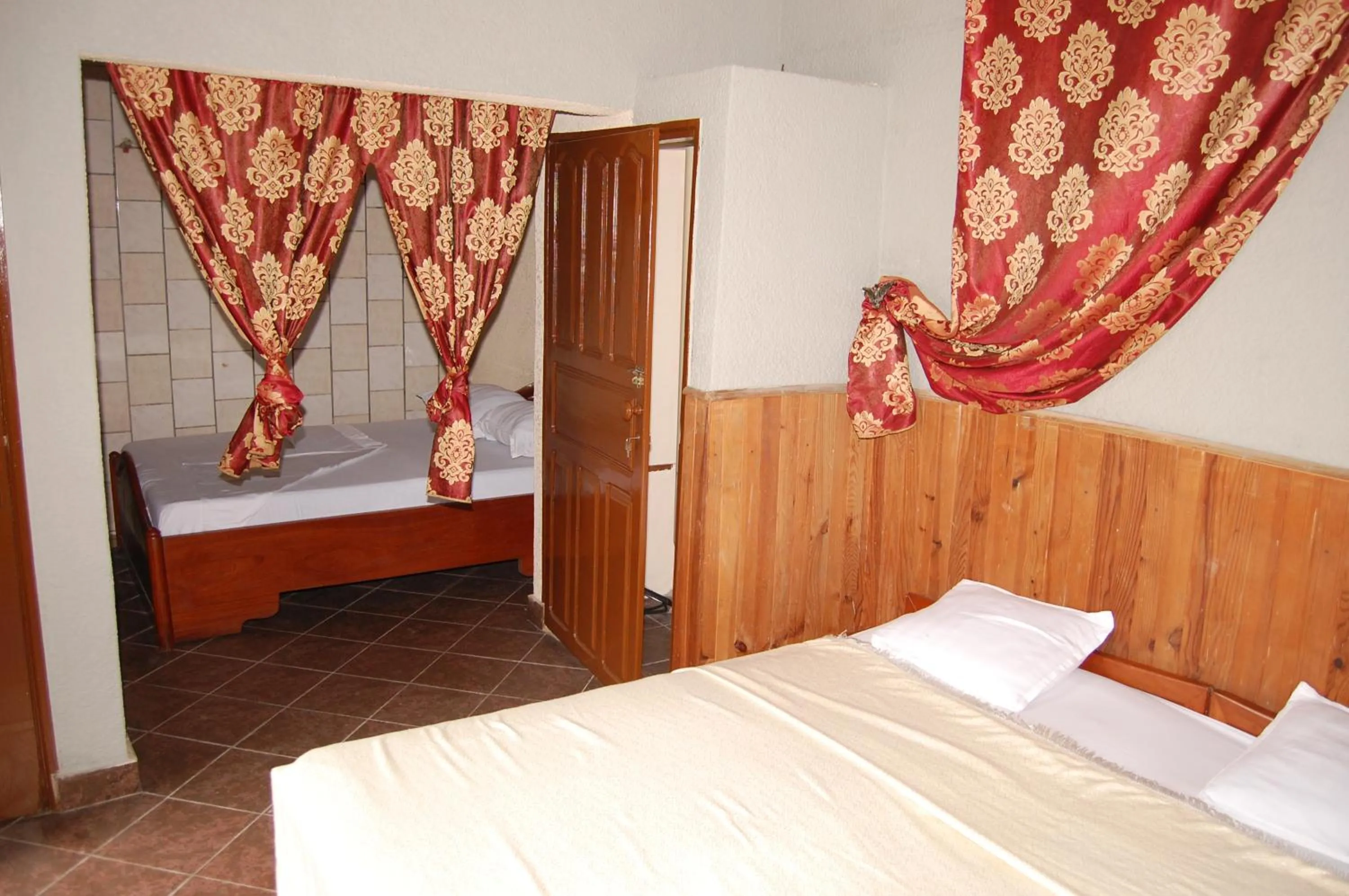 Bed in Benin Hotel Terminus