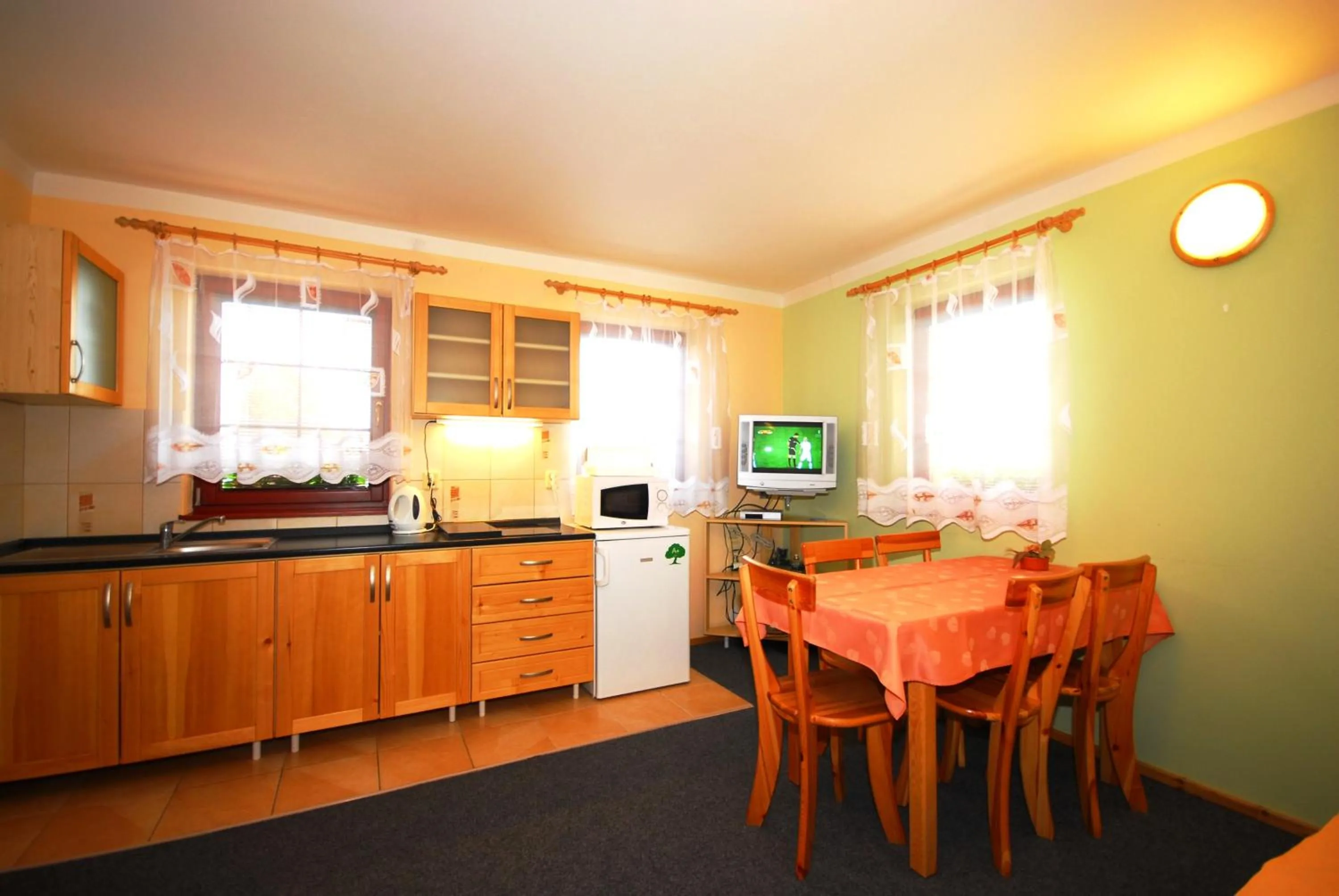 Kitchen or kitchenette in Ada Apartments