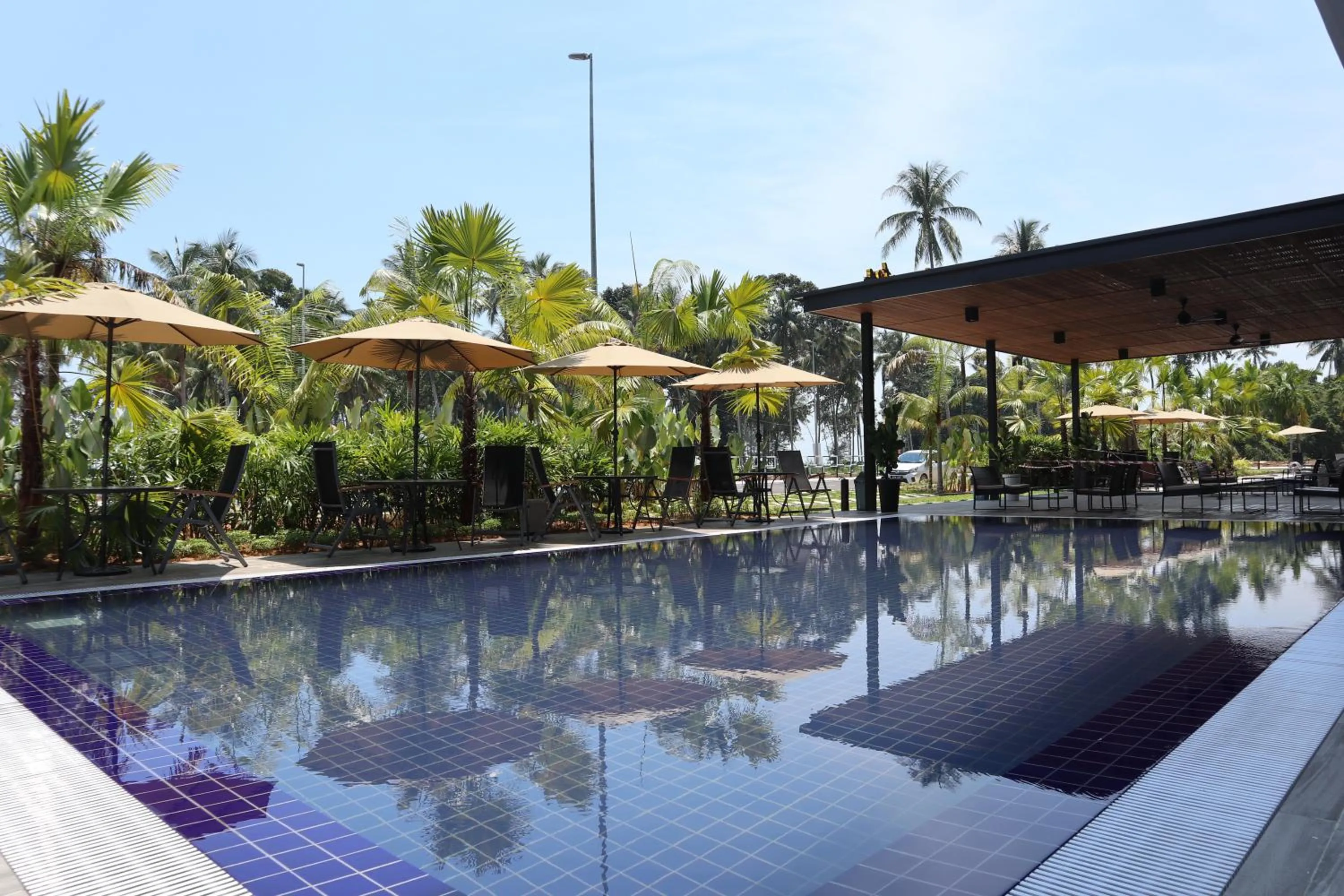 Swimming pool in Roxy Sematan Villa & Townhouse