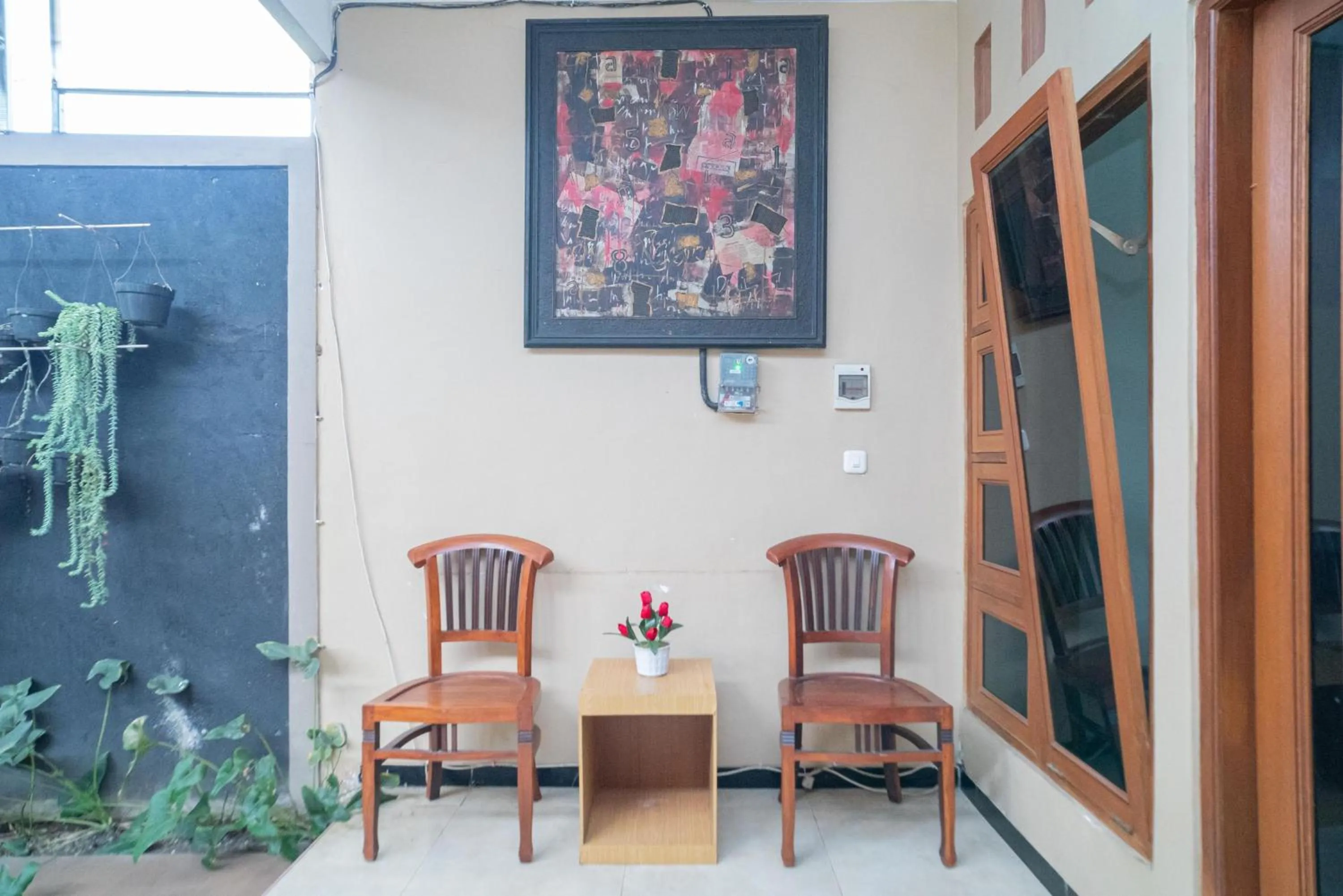 Seating area in RedDoorz At Villa Akbar 3