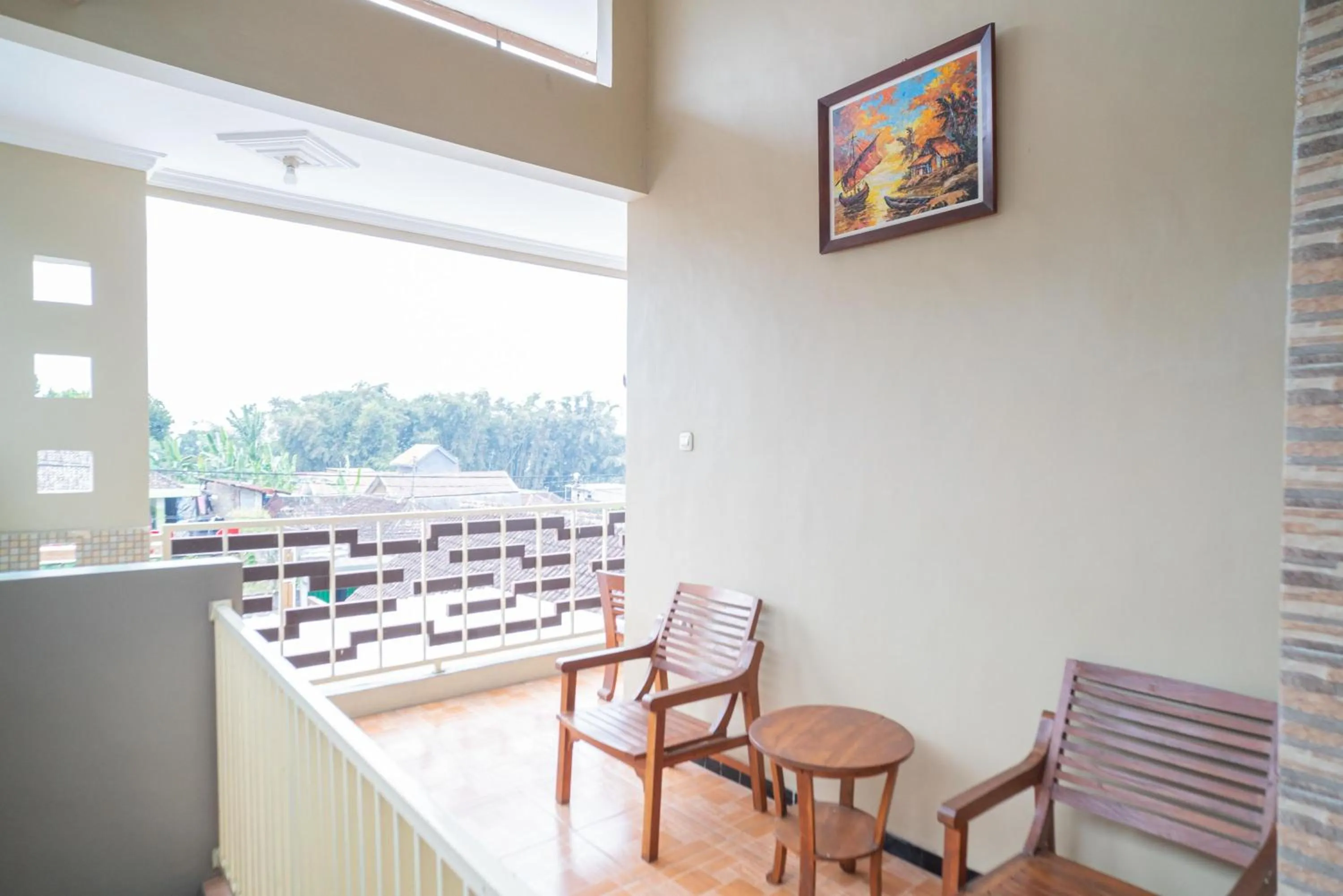 Seating area in RedDoorz At Villa Akbar 3