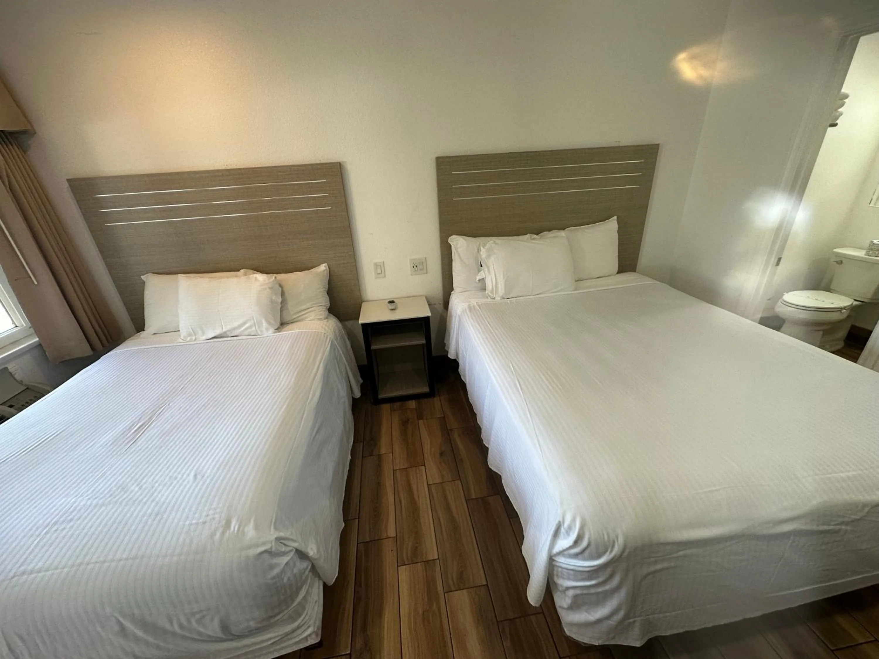 Bed in Town and Country Inn