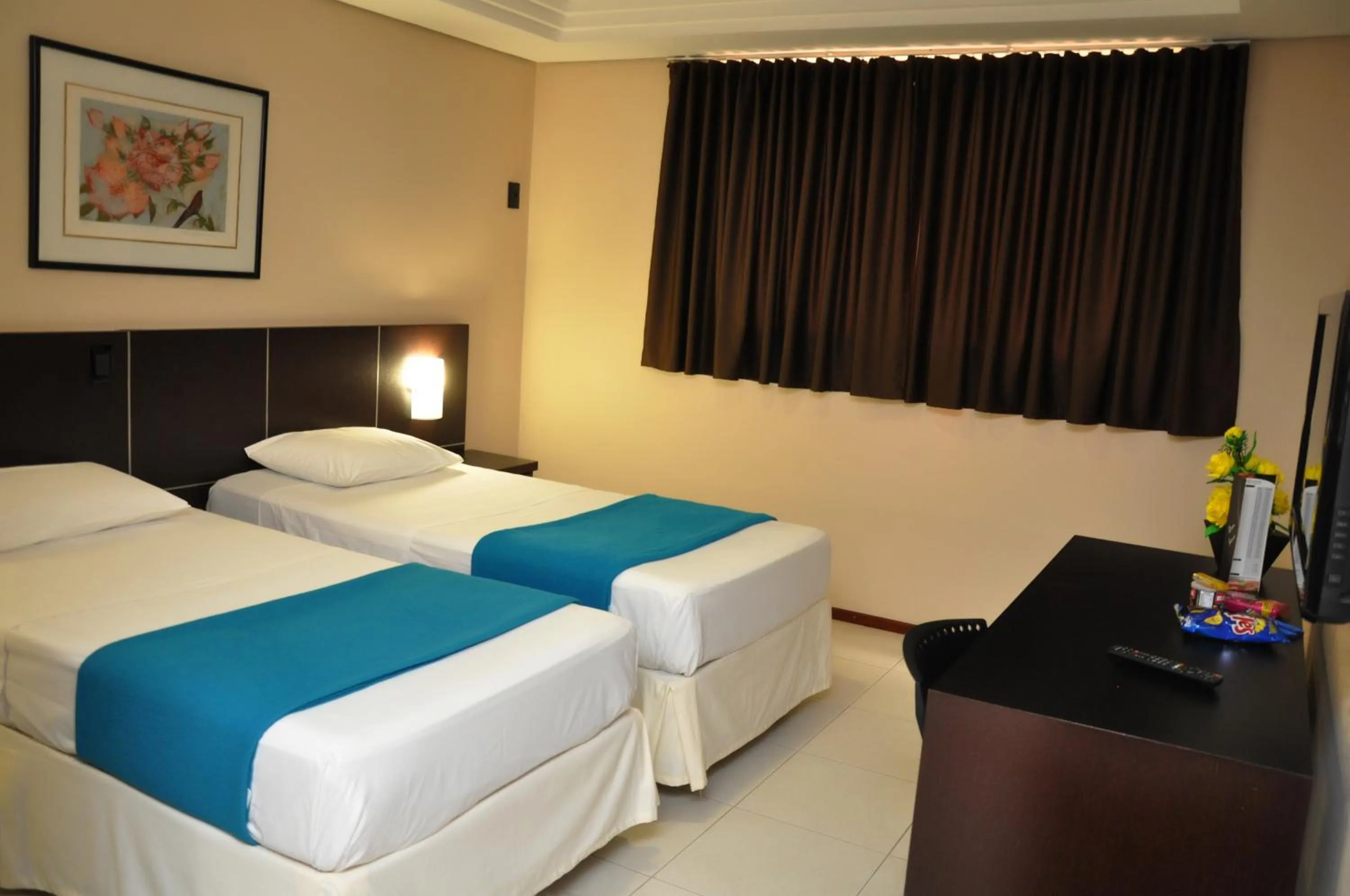 Bed in Crystal Plaza Hotel