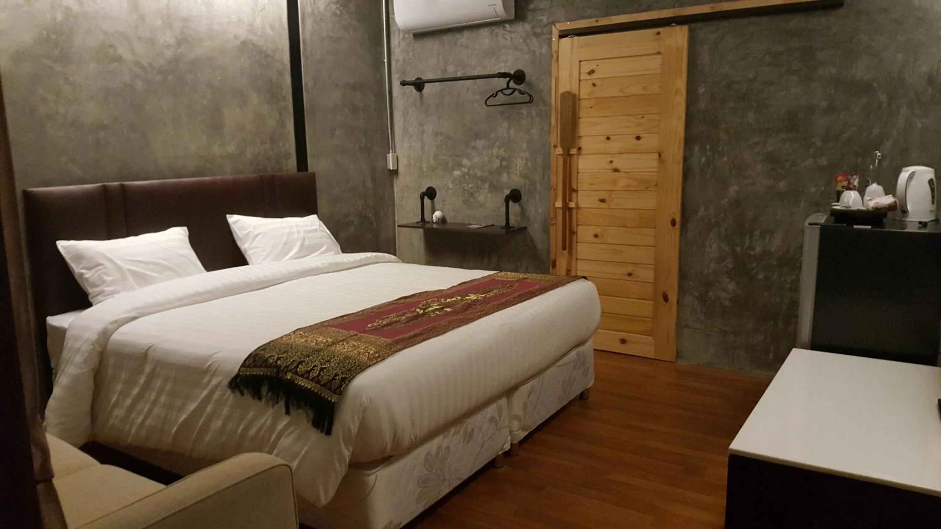 Bed in Naga Tara Boutique Resort