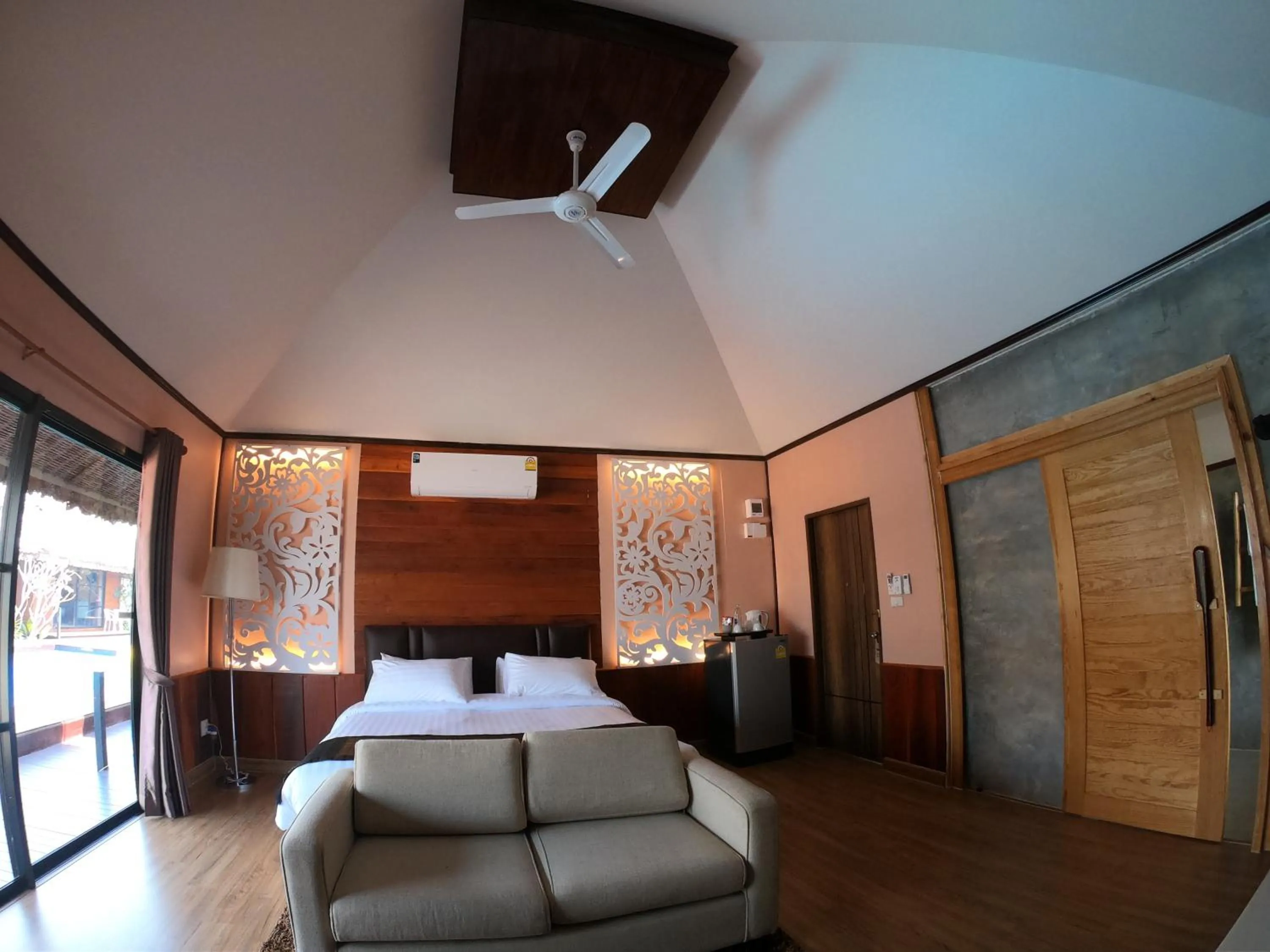 Bed in Naga Tara Boutique Resort