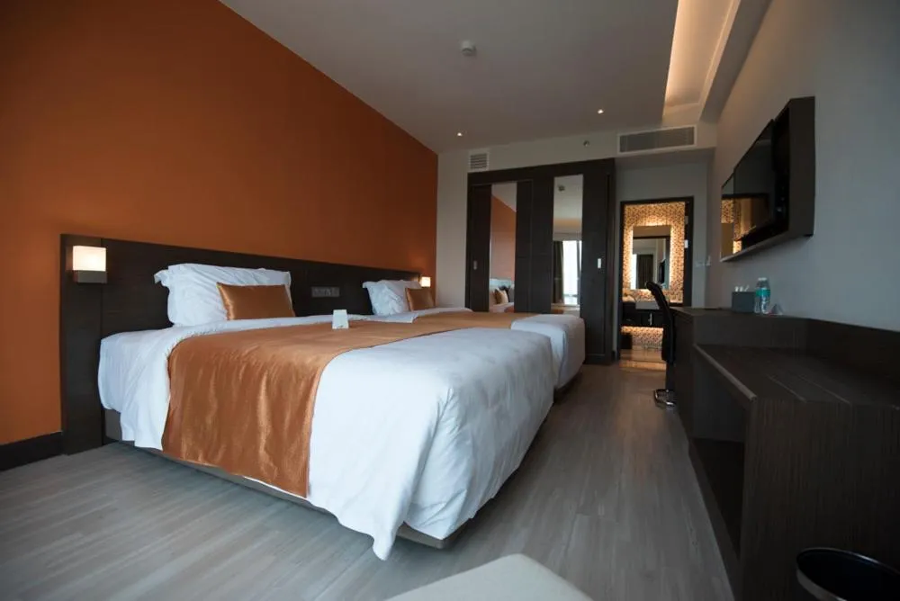 Bed in Astana Wing - Riverside Majestic Hotel