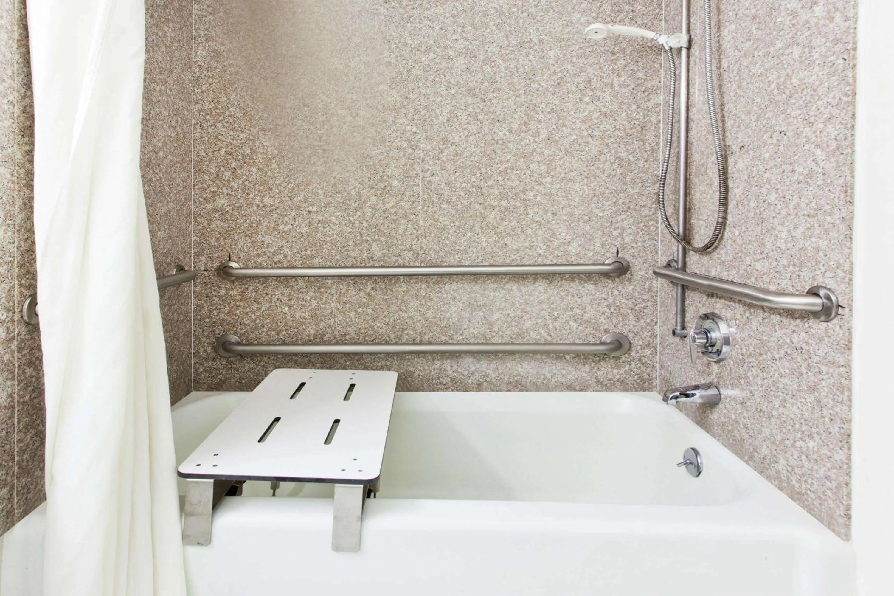 Bathroom in Super 8 by Wyndham Tuscaloosa