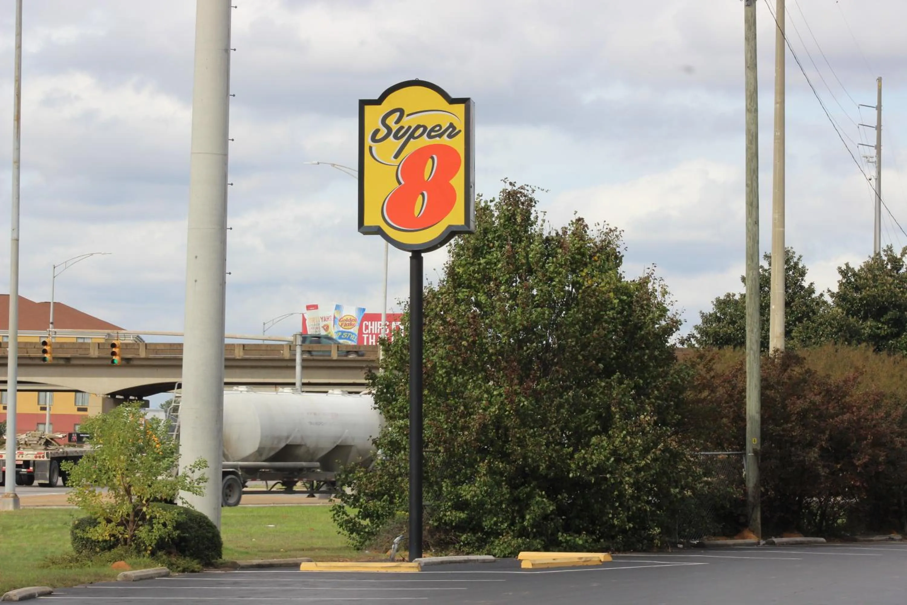 Property logo or sign in Super 8 by Wyndham Tuscaloosa