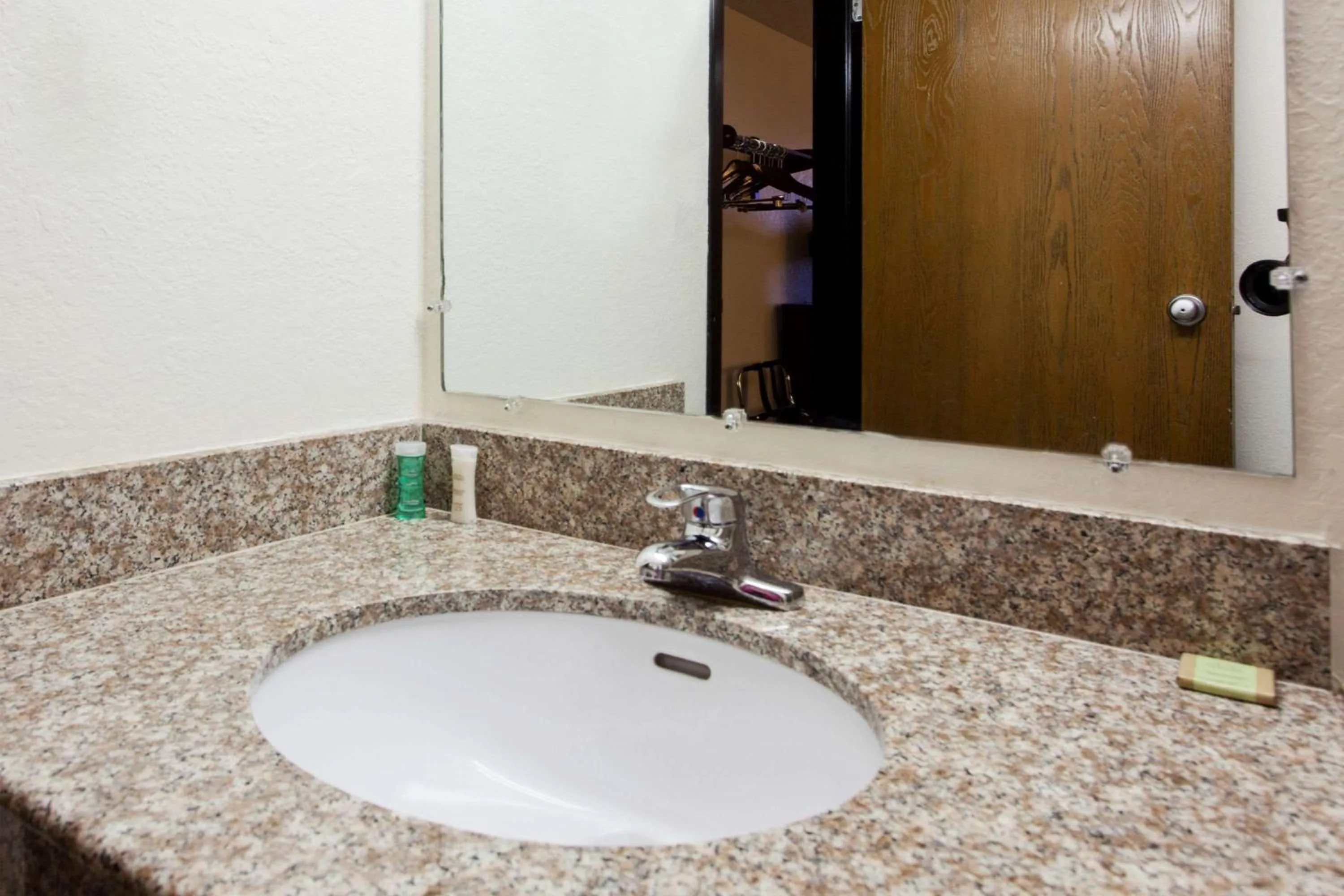 Bathroom in Super 8 by Wyndham Tuscaloosa