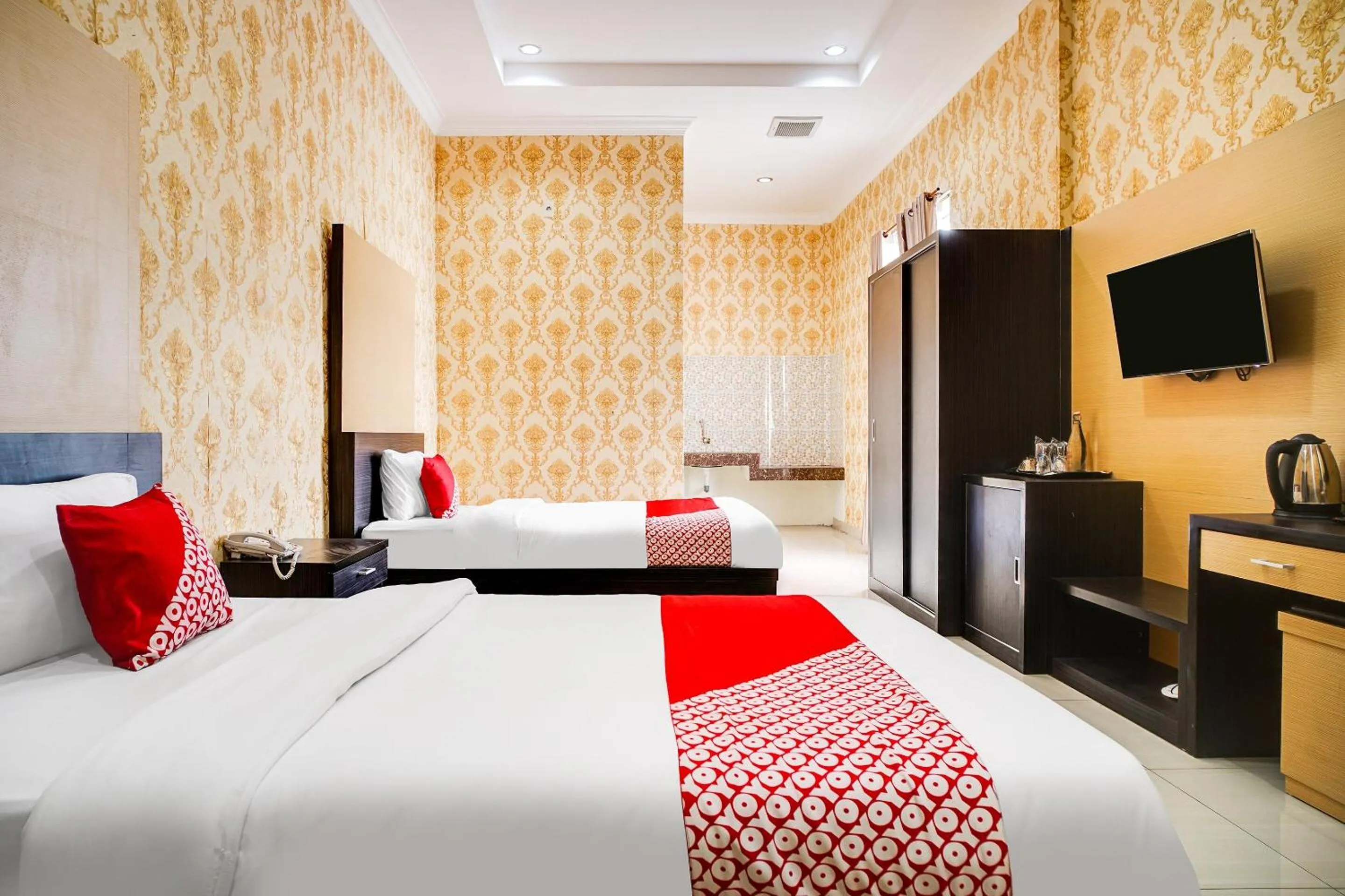 Bedroom in Capital O 540 Esther Hotel