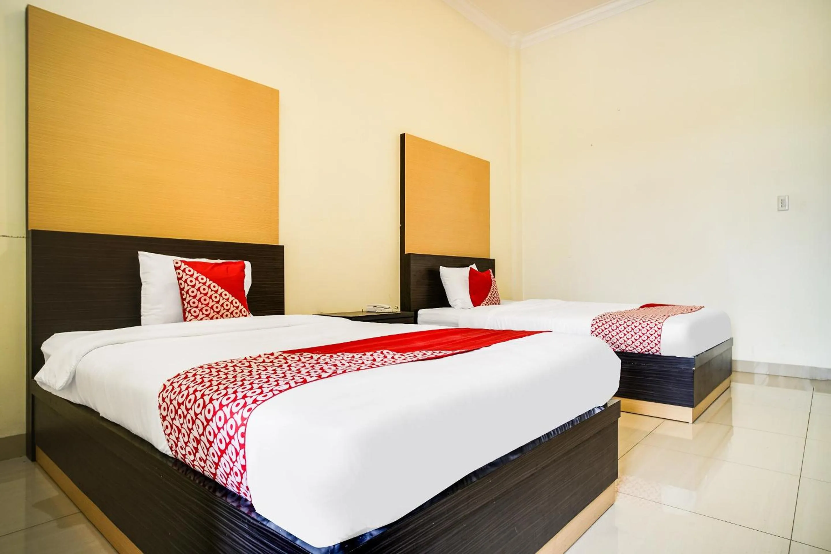 Bedroom in Capital O 540 Esther Hotel