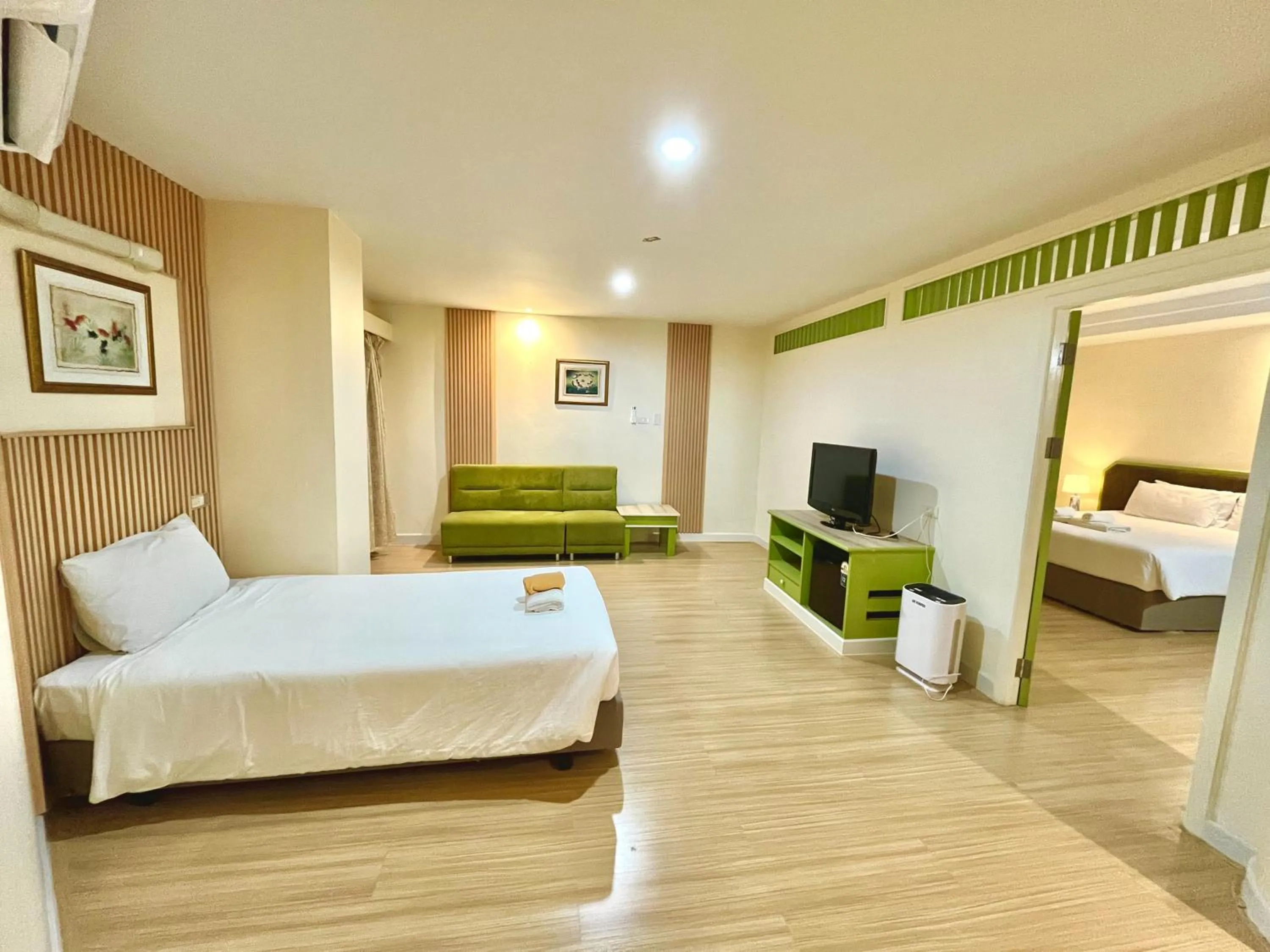 Bedroom, Bed in Friendlytel Hotel