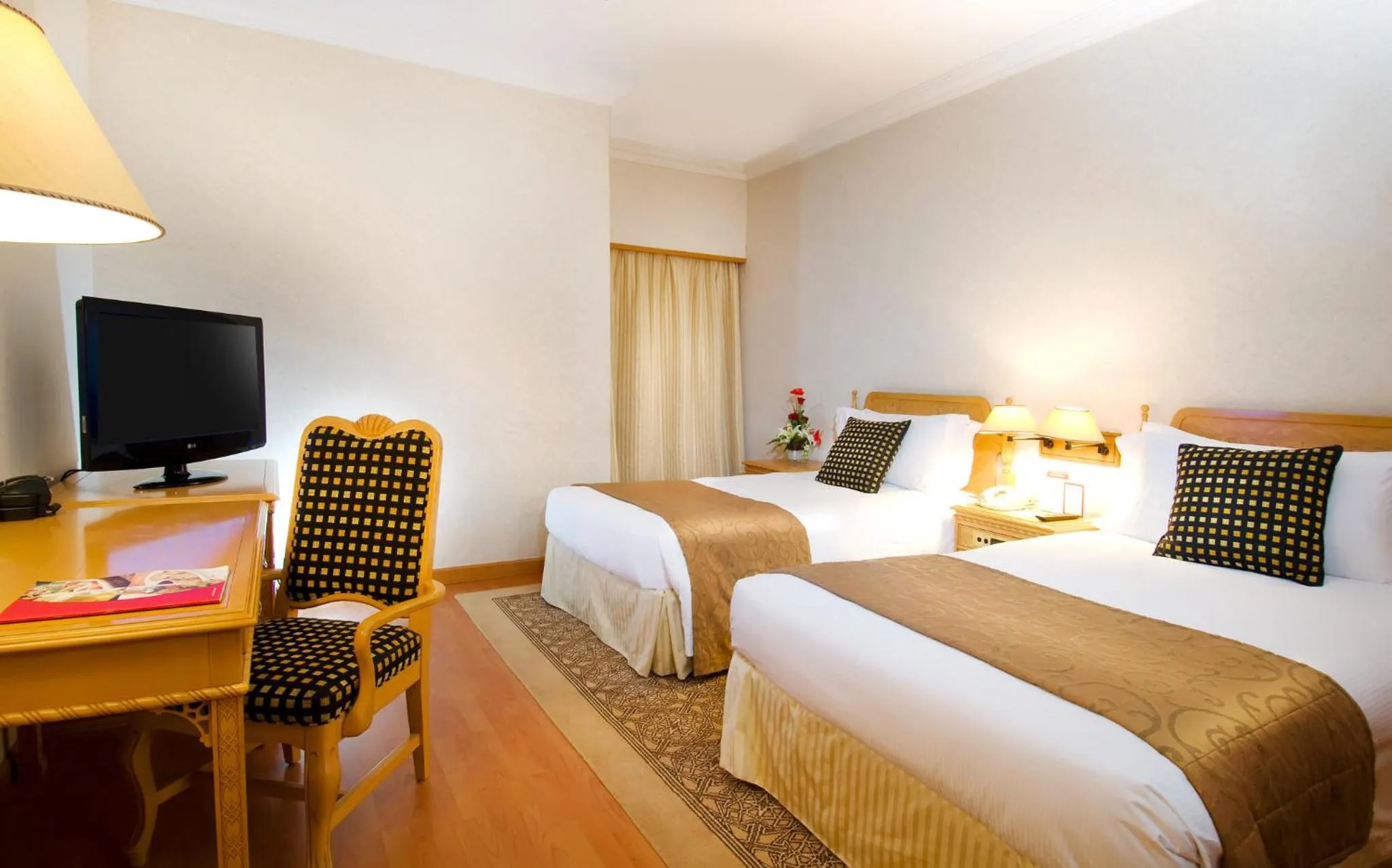 Photo of the whole room, Bed in Millennium Plaza Downtown Suites