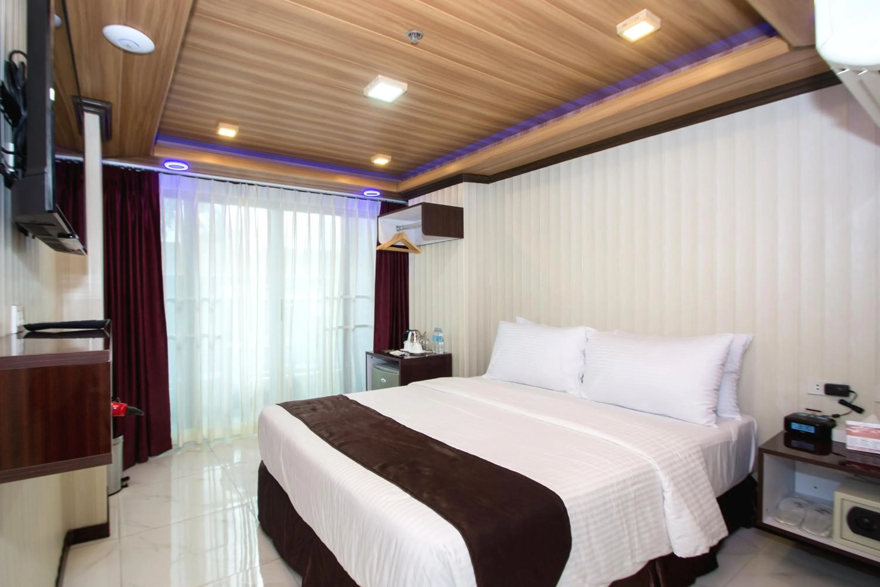 Bed in Diamond Water Edge Resort