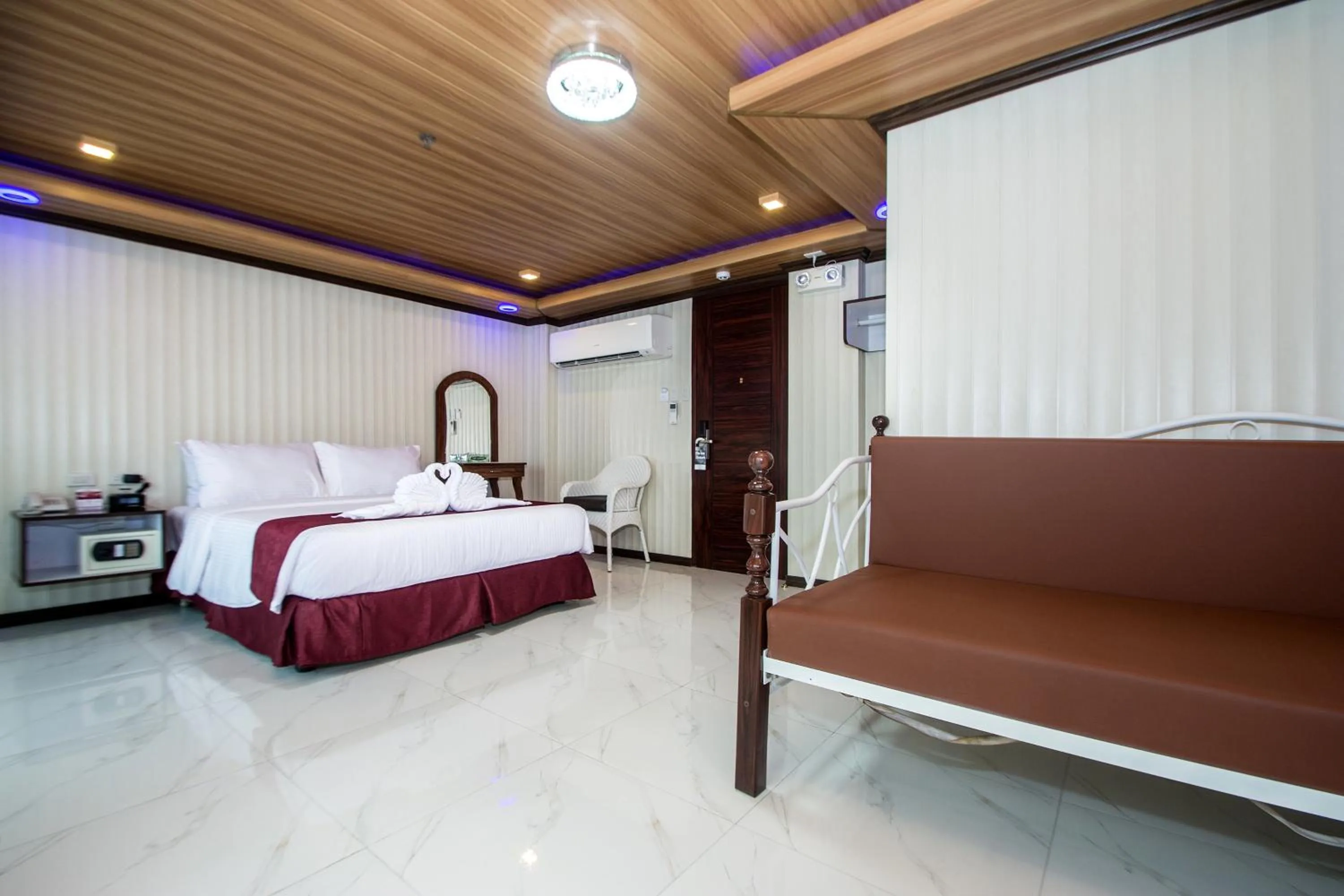 Seating area, Bed in Diamond Water Edge Resort