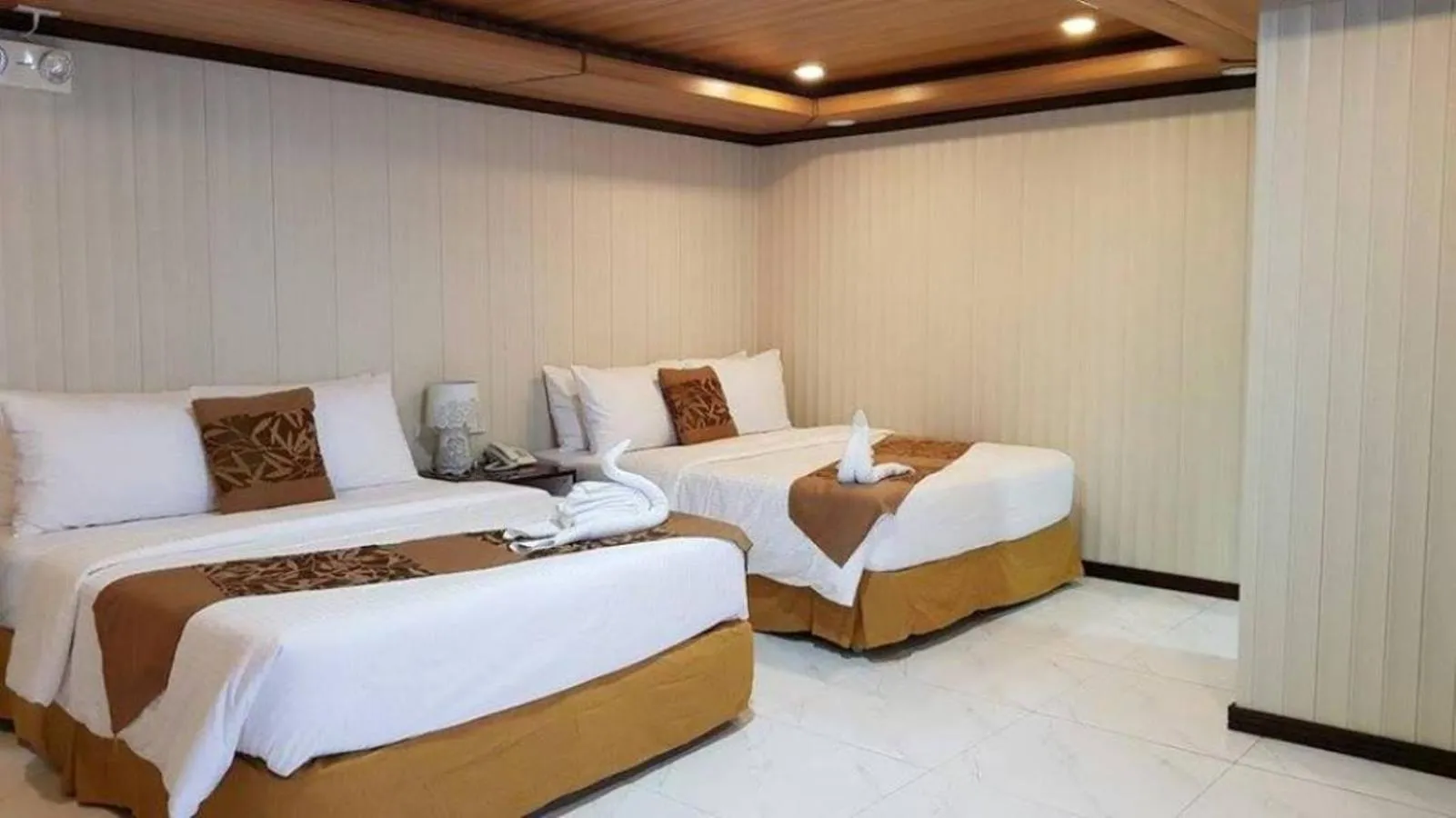 Bed in Diamond Water Edge Resort