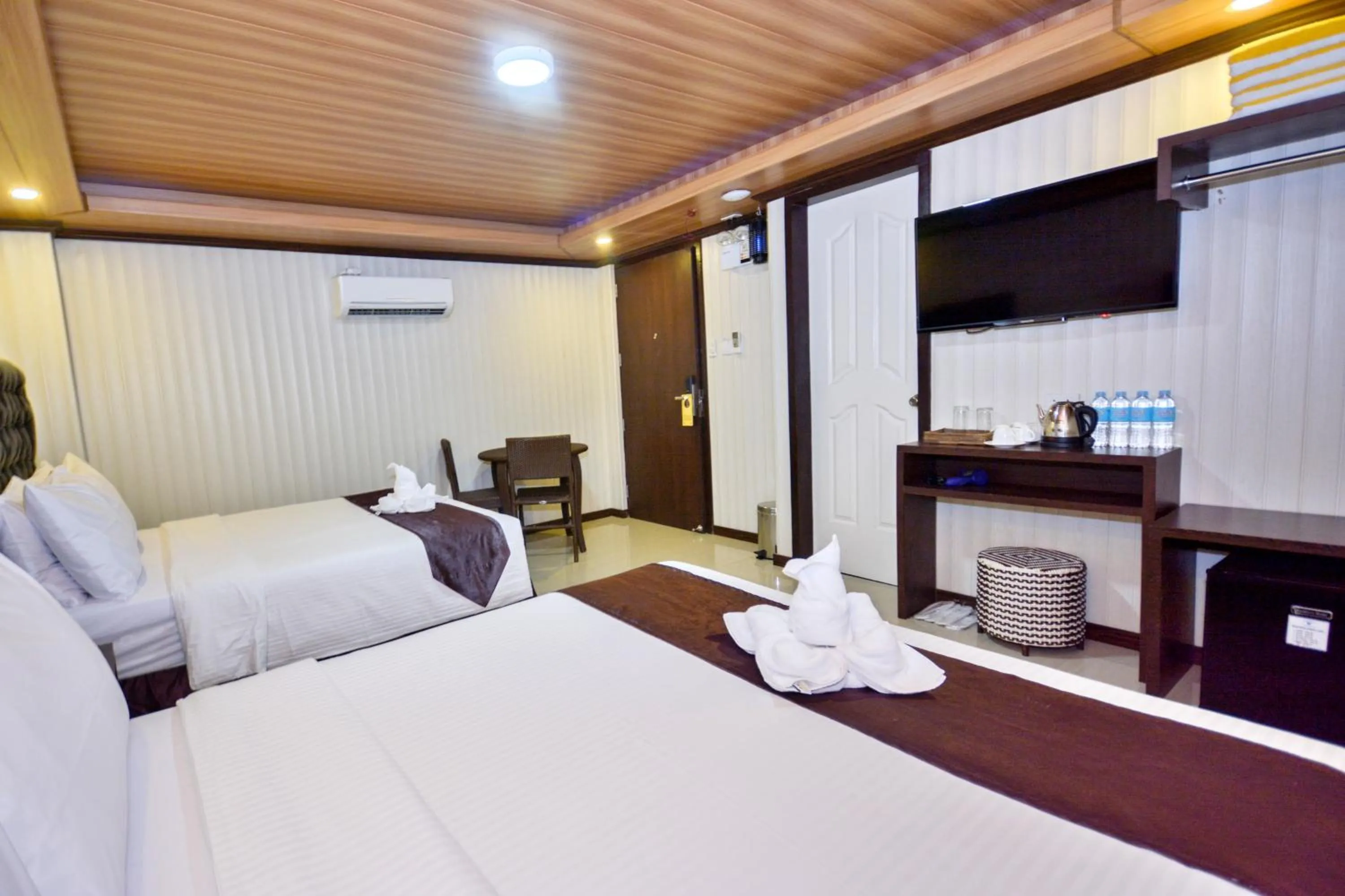 Bed in Diamond Water Edge Resort