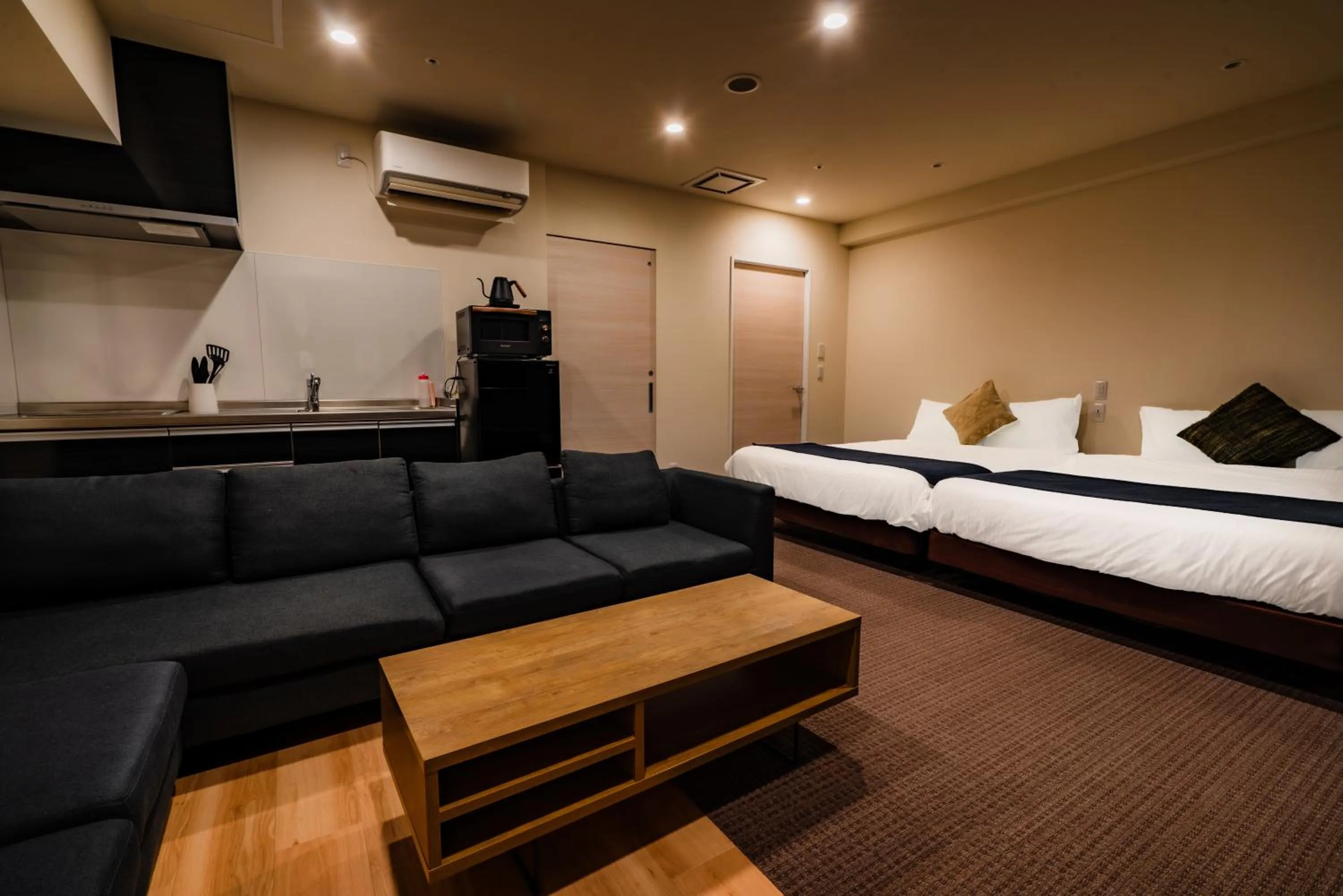 Photo of the whole room, Bed in Randor Hotel Sapporo Suites