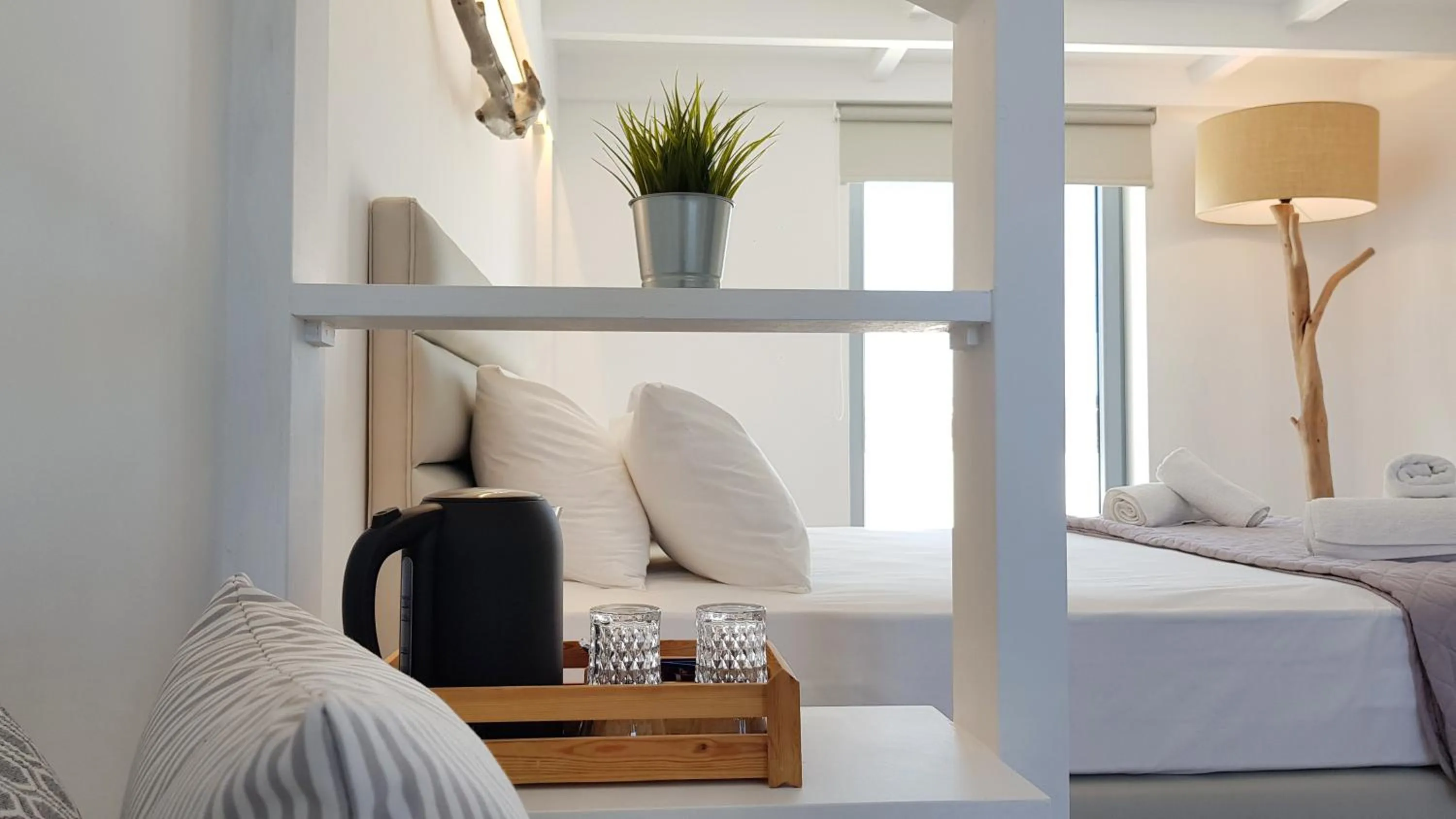 Bed in Hermoso Luxury Suites