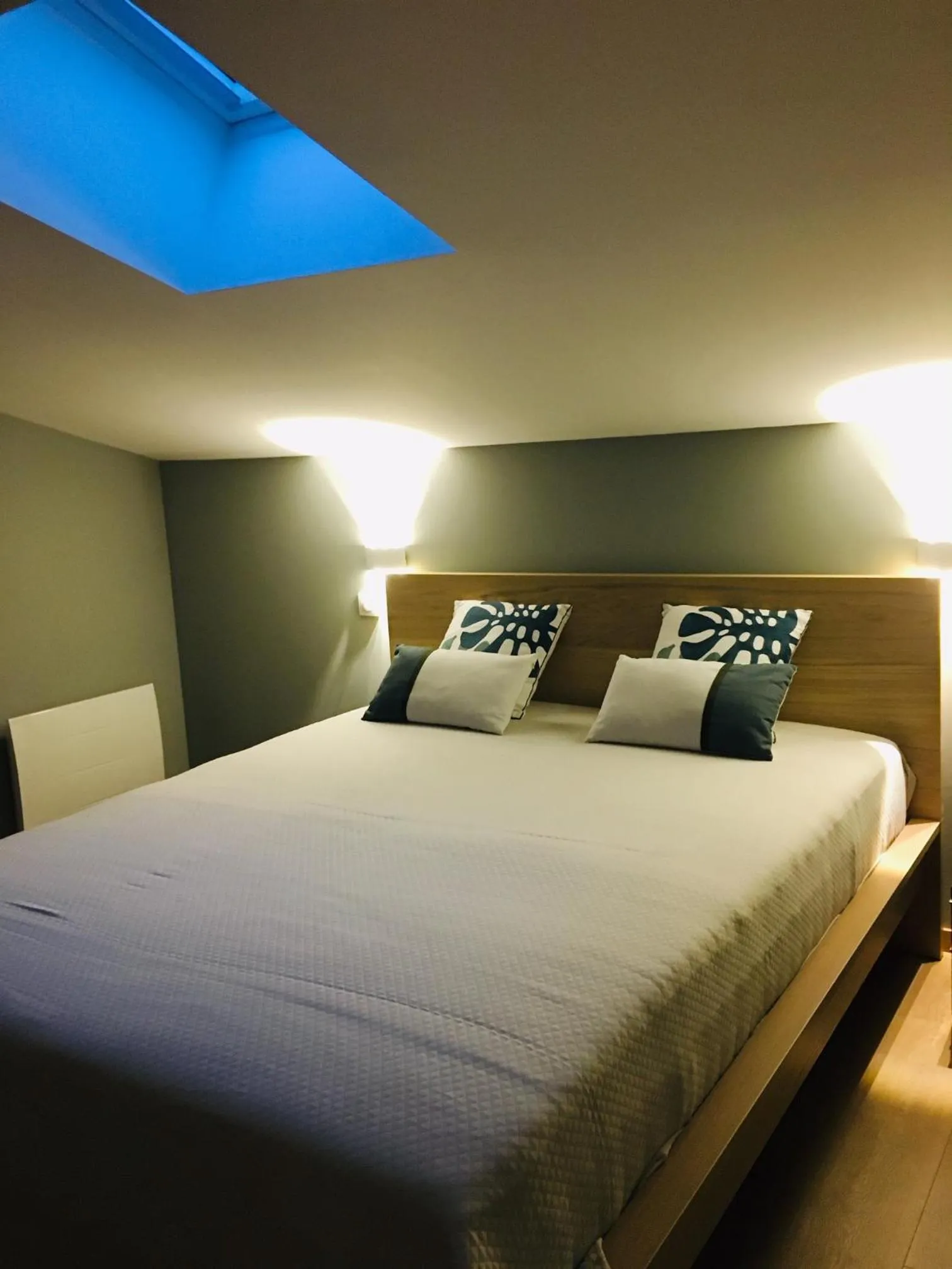 Bed in LES CHAMBRES D'HOTES DU PALAIS