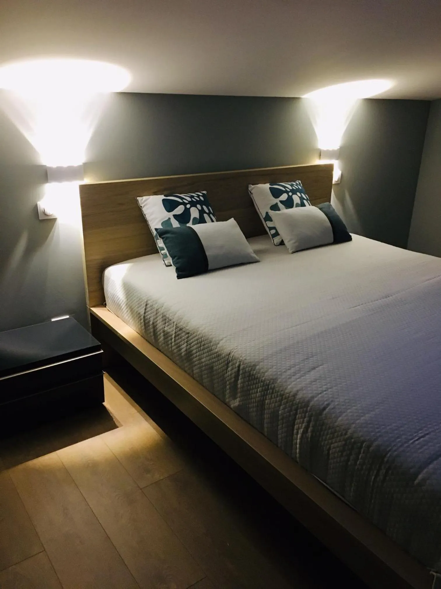 Bed in LES CHAMBRES D'HOTES DU PALAIS