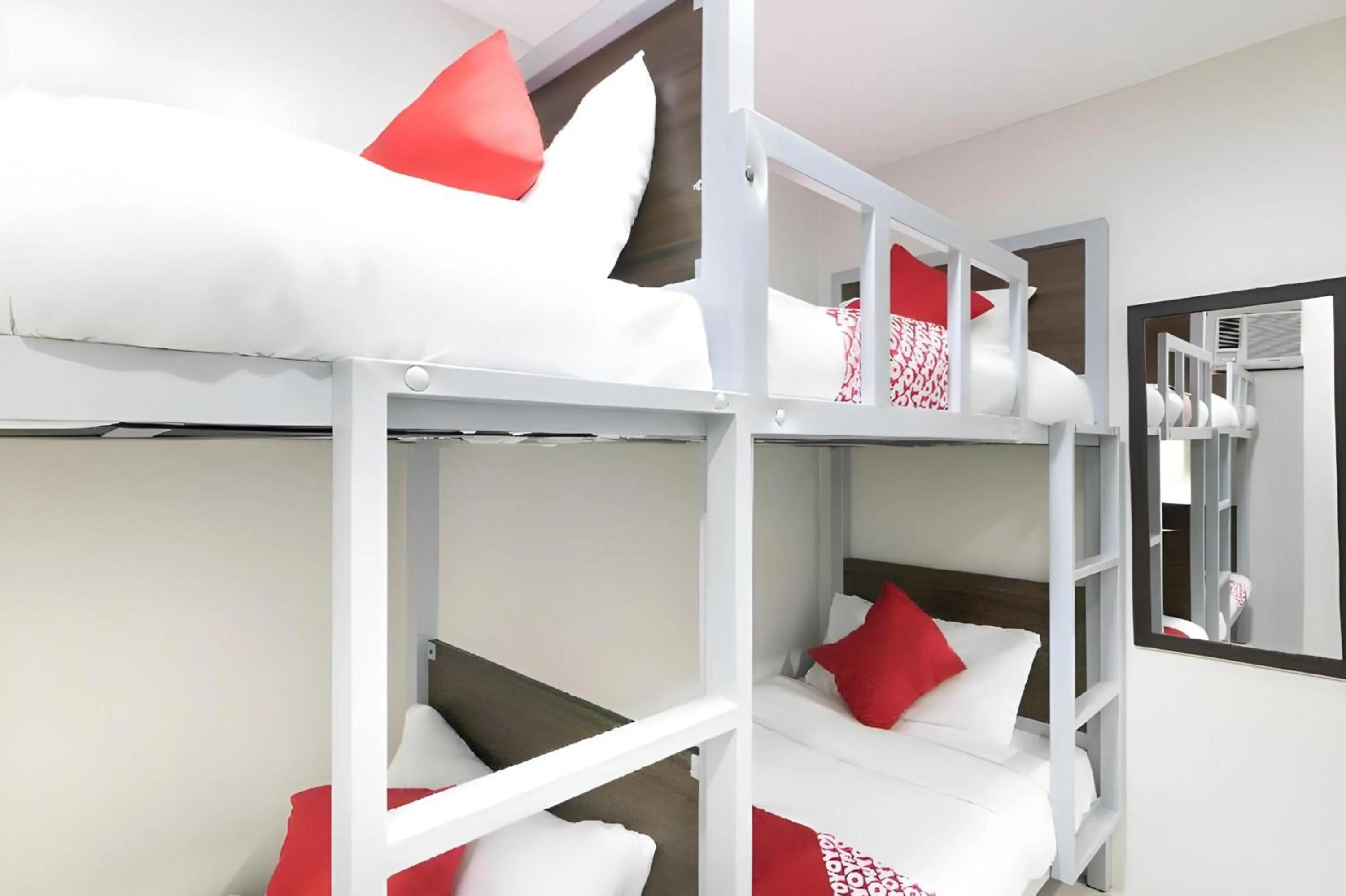 Bedroom, Bed in OYO 152 Sangco Condotel