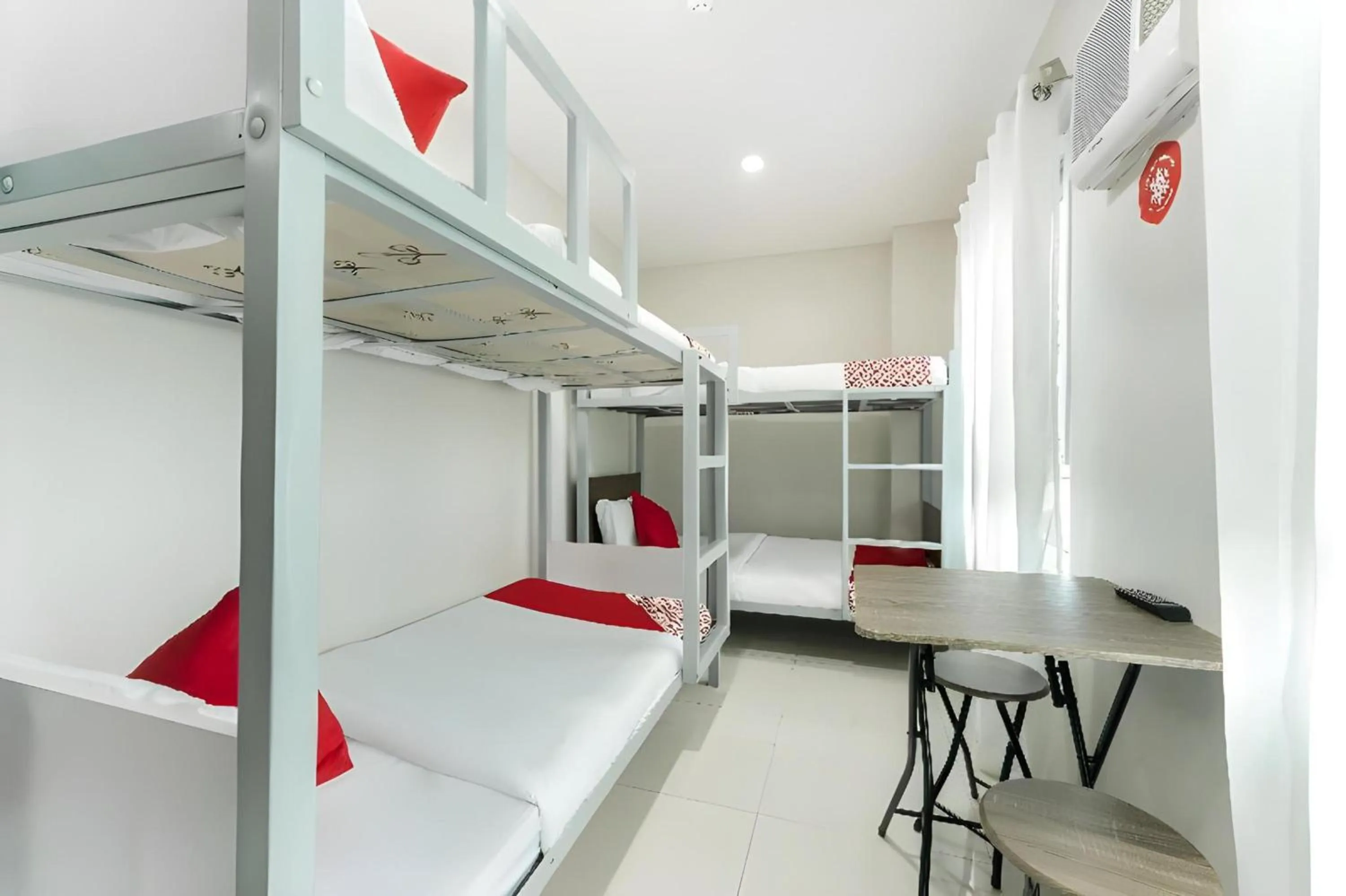 Bedroom, Bed in OYO 152 Sangco Condotel