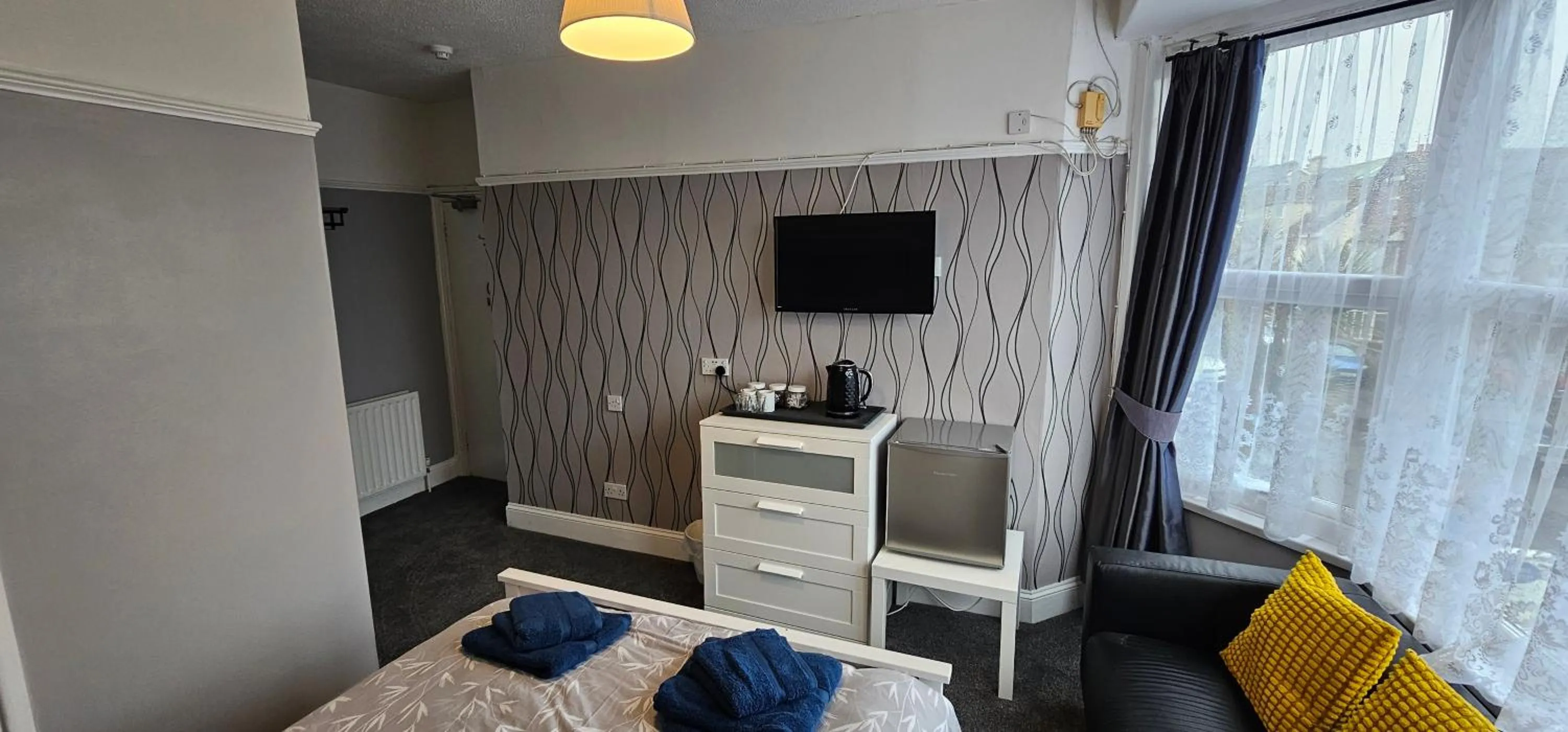 Bed in The Roslyn Guest House