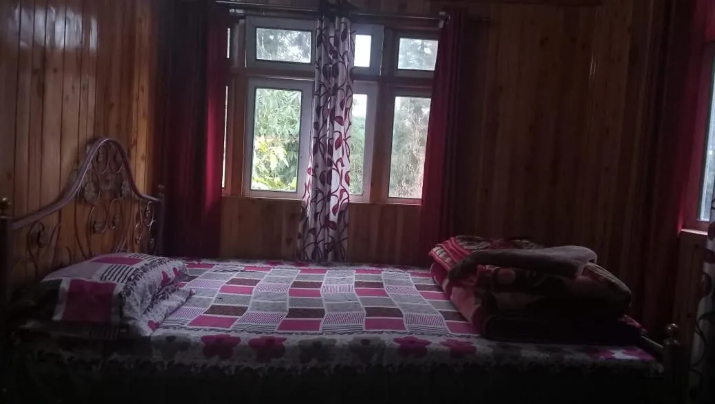 Bed in Sinkawli Homestay