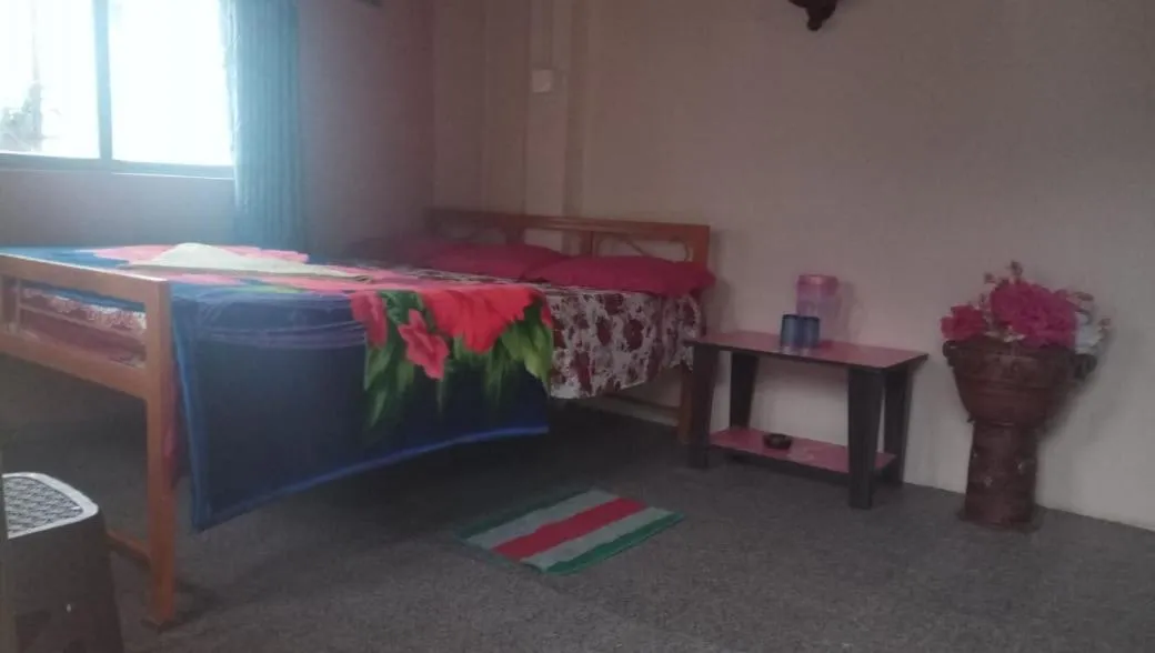 Bed in Sinkawli Homestay