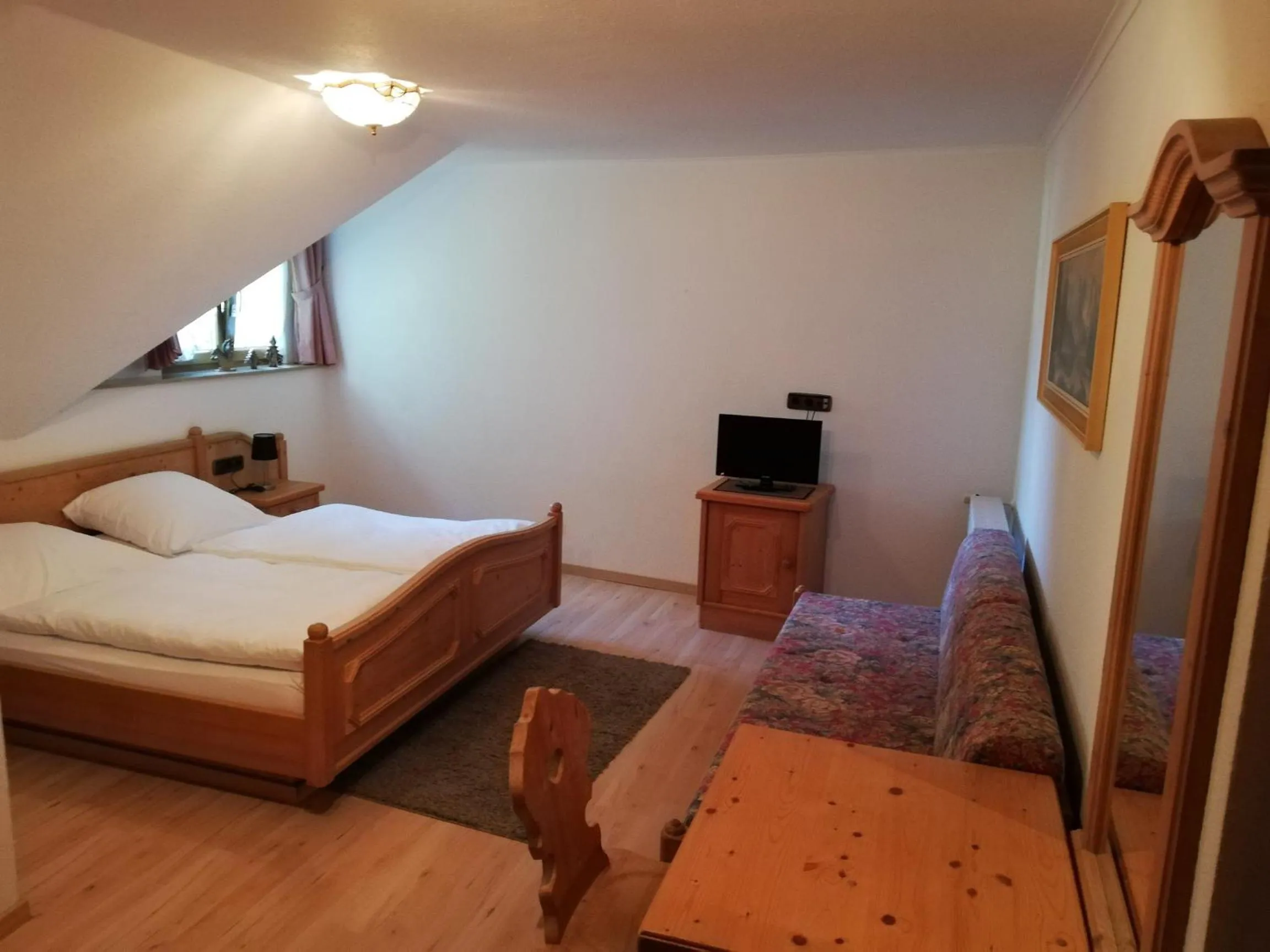 Photo of the whole room, Bed in Gästehaus Rössle