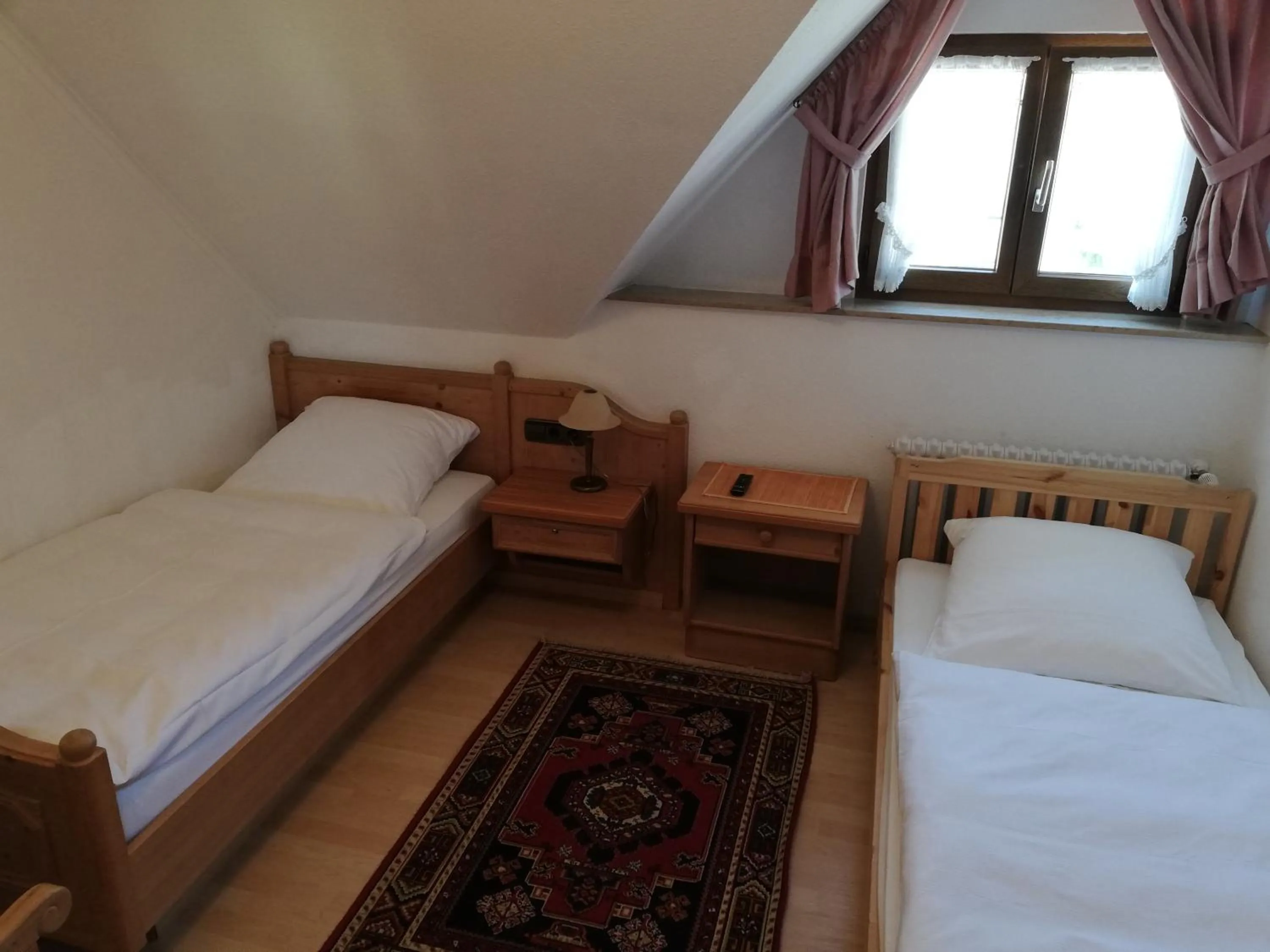 Photo of the whole room, Bed in Gästehaus Rössle