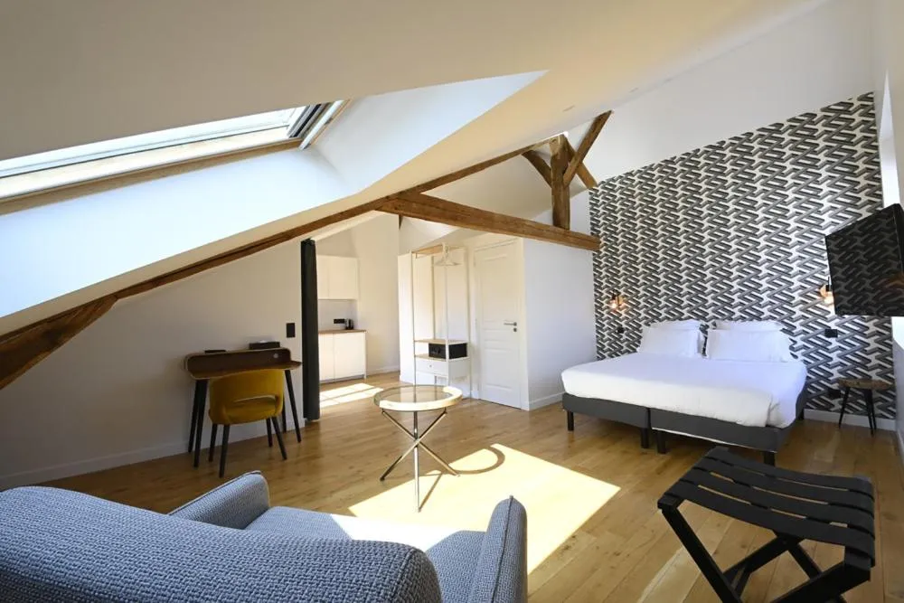 Bed in Manoir de l'évêché et Spa